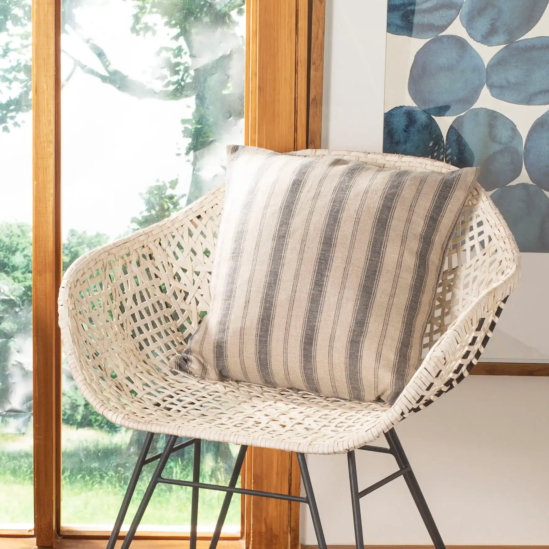 Varina Pillow in Blue / Natural in a styled room