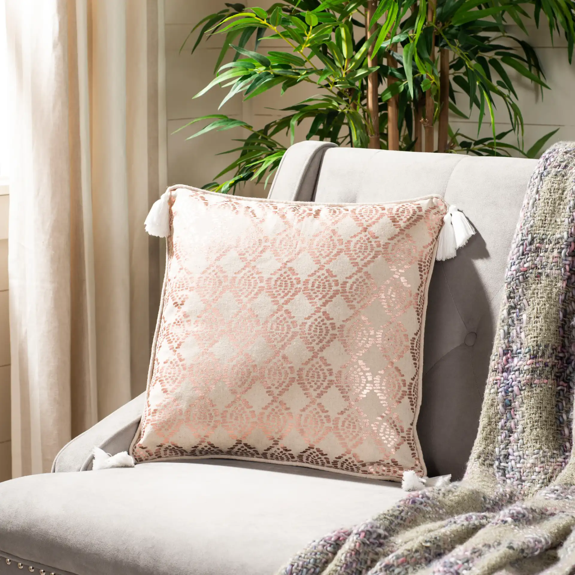 Remis Pillow in Rose Gold / White in a styled room
