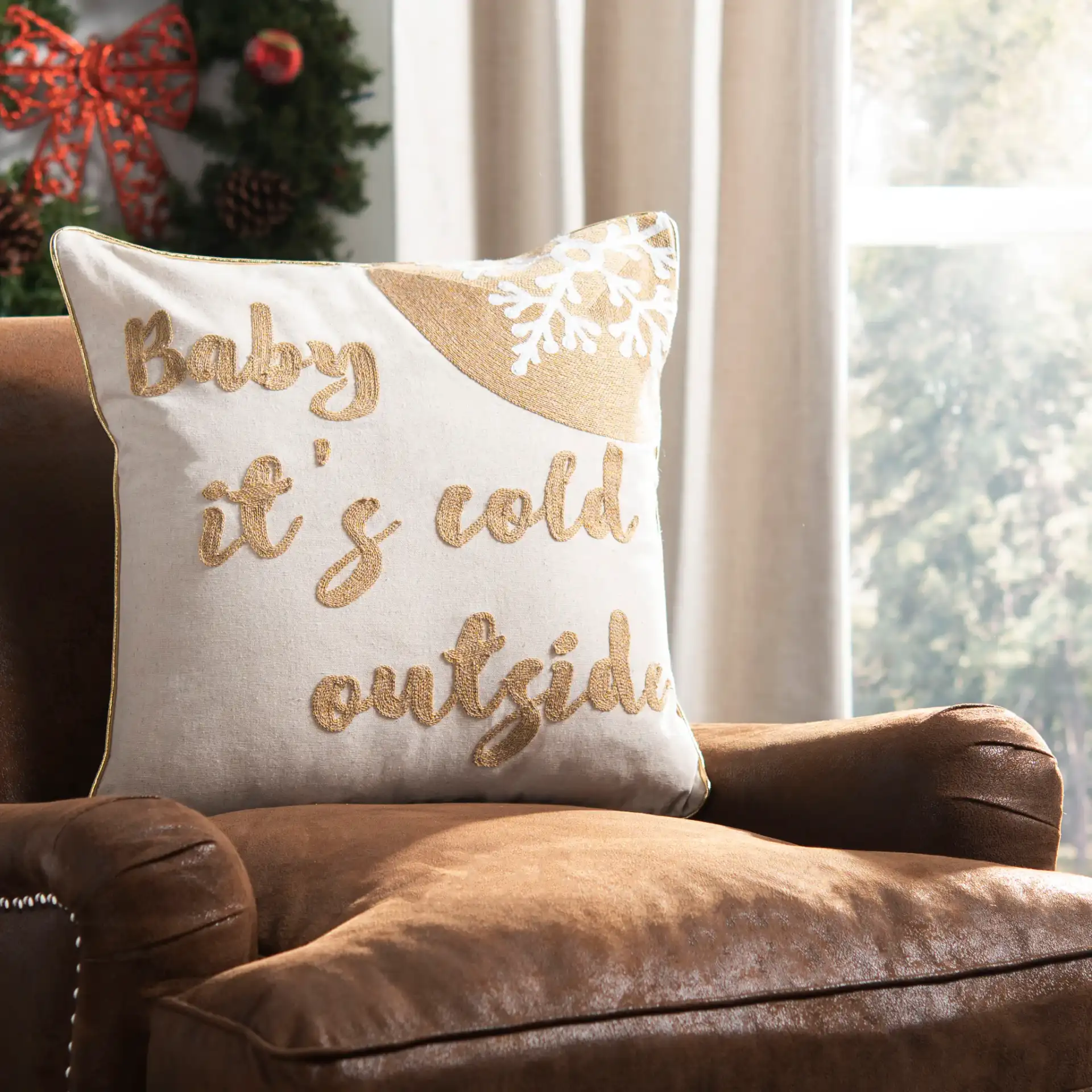 Cold Outside Pillow in Beige / Gold in a styled room