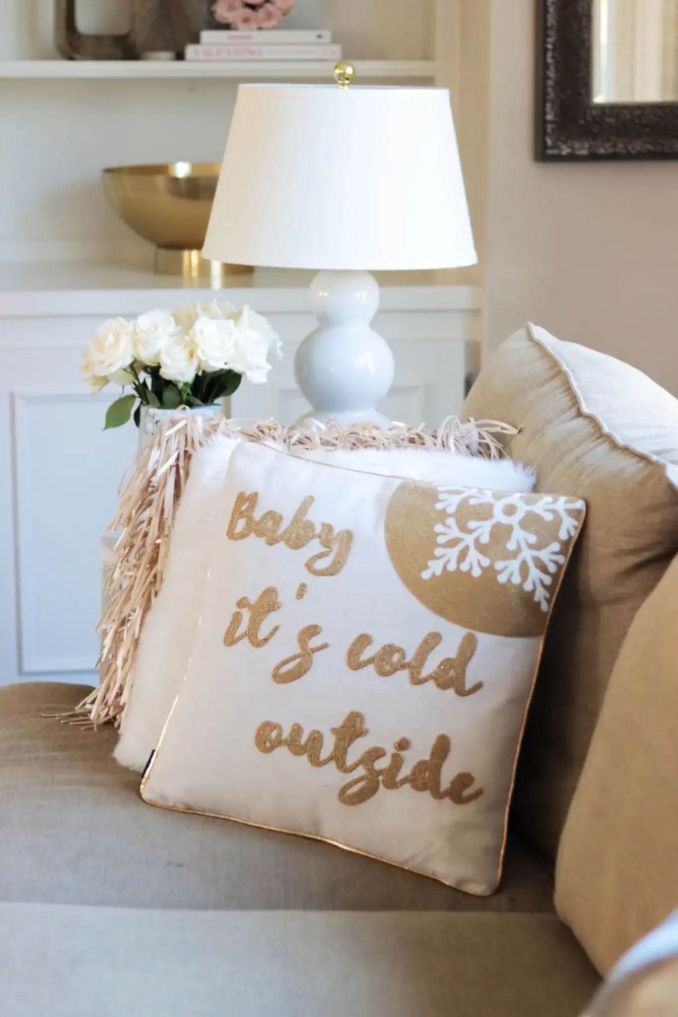 Cold Outside Pillow in Beige / Gold in a styled room