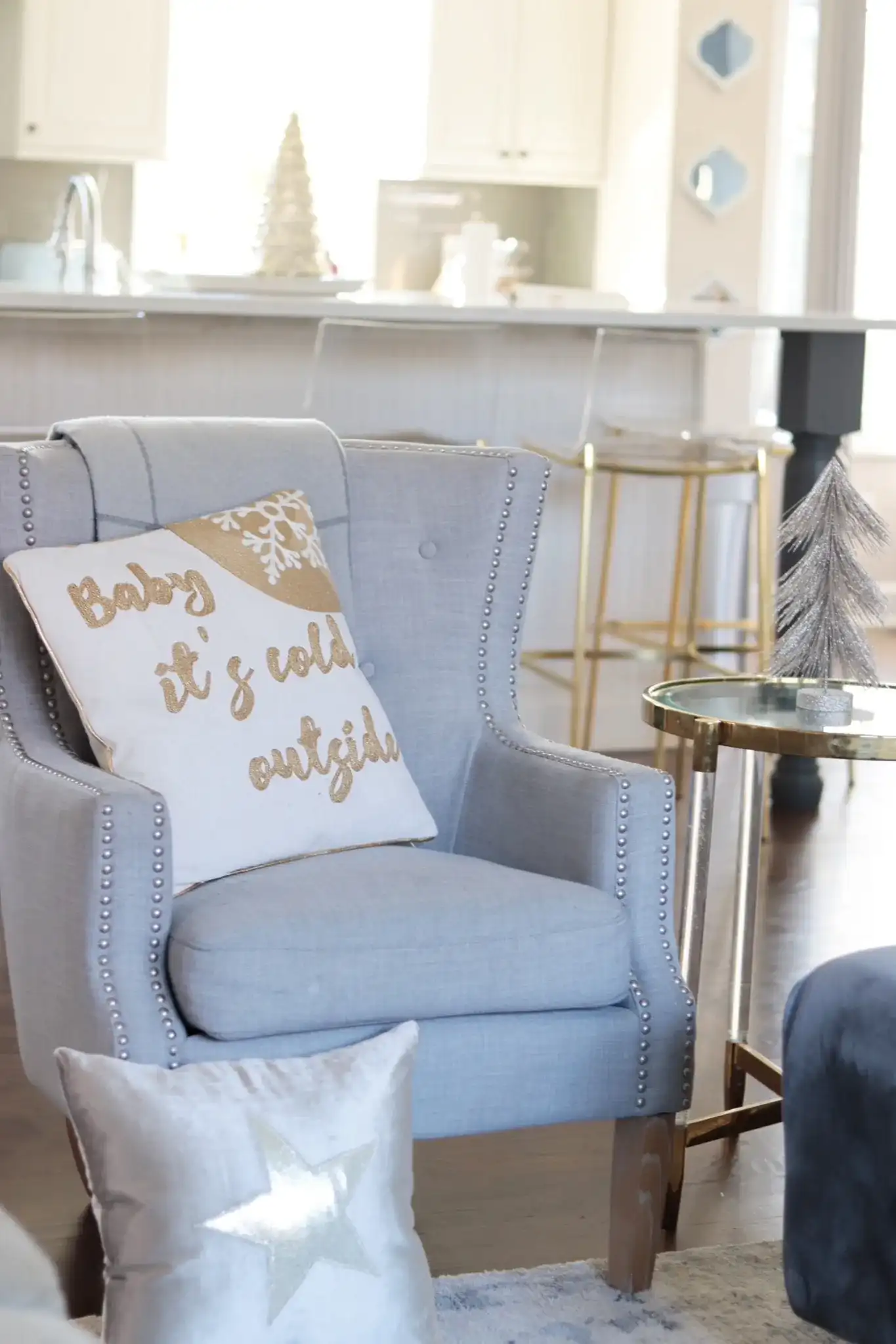 Cold Outside Pillow in Beige / Gold in a styled room