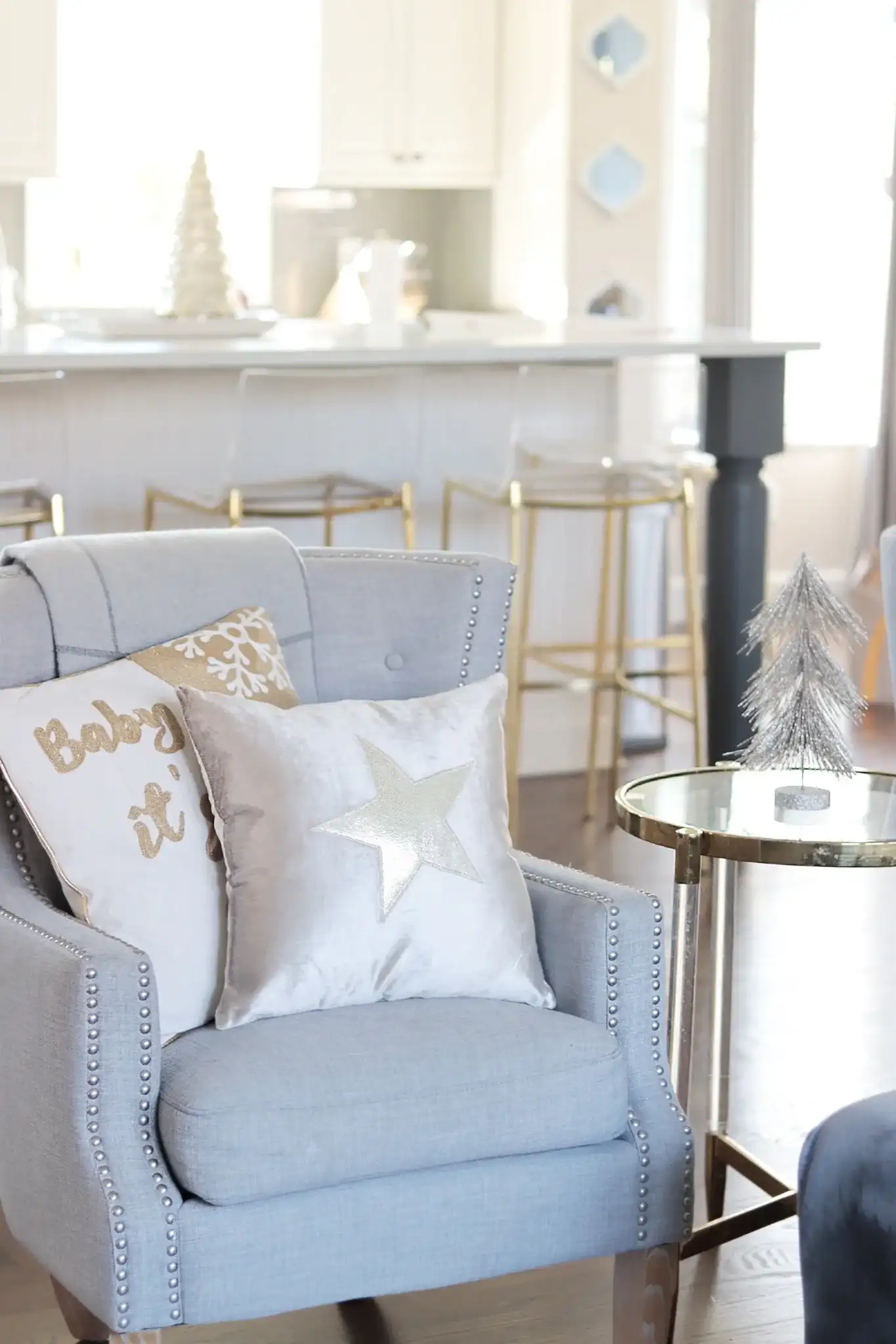 Cold Outside Pillow in Beige / Gold in a styled room
