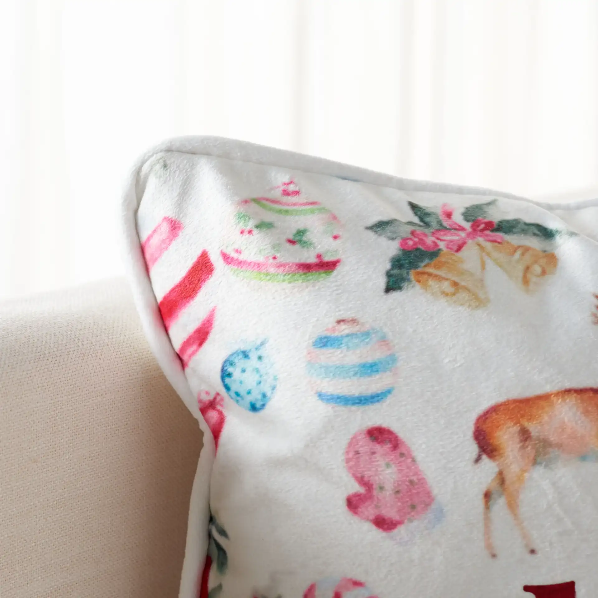 Mable Pillow in Assorted / Red in a styled room