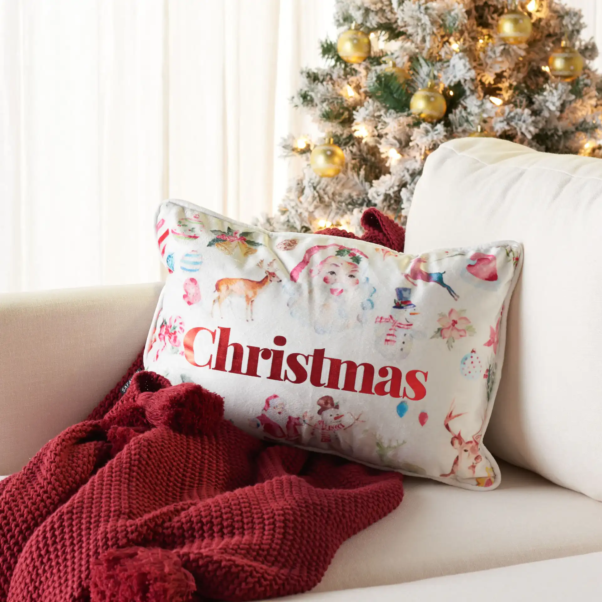 Mable Pillow in Assorted / Red in a styled room