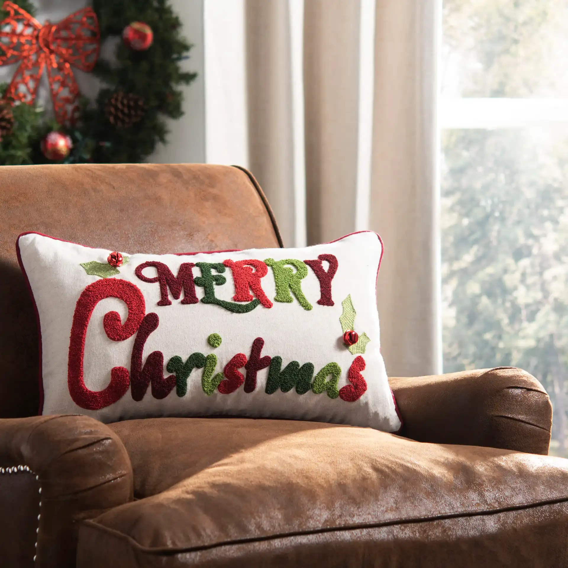 Jingles Pillow in Green / Red / Beige in a styled room