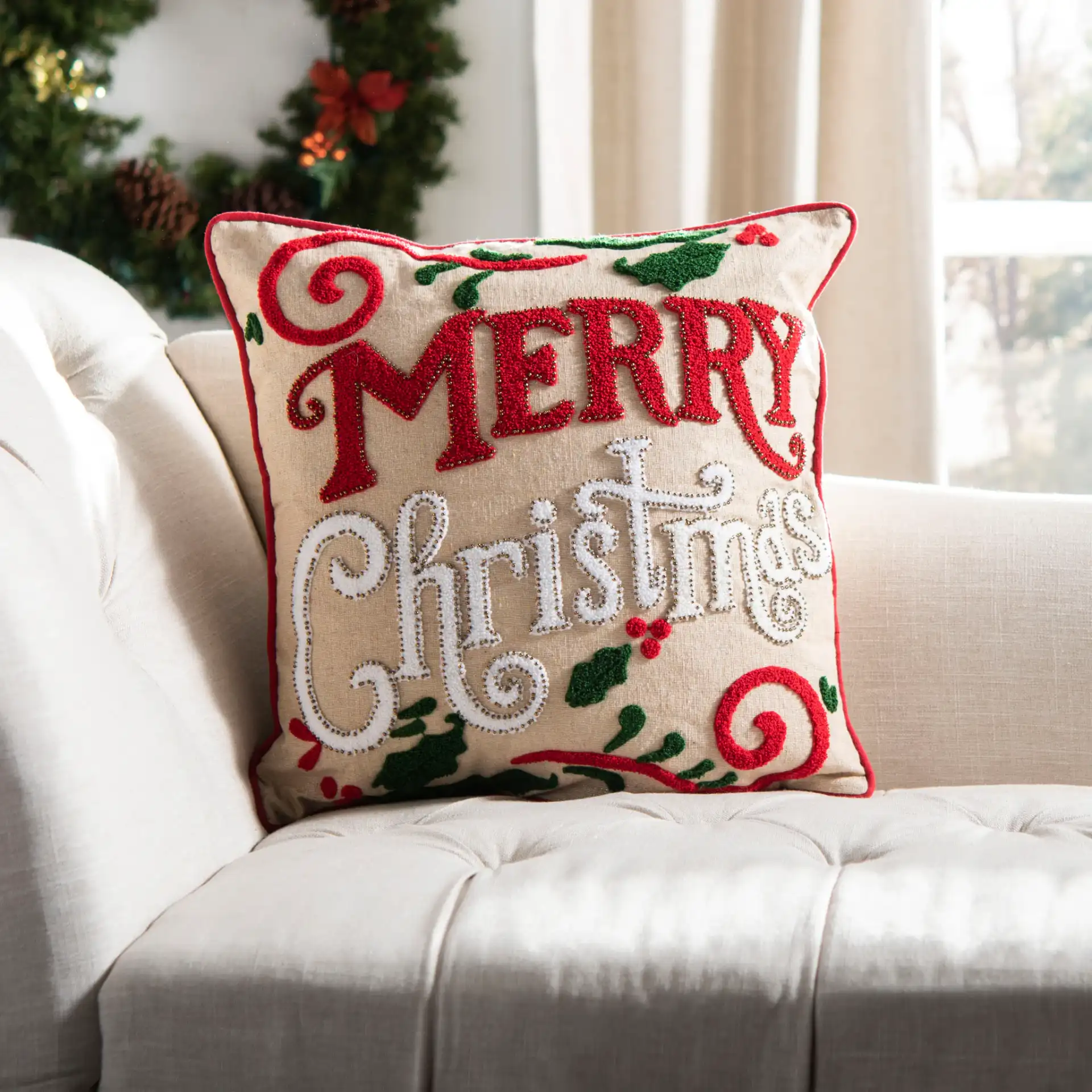 Merry Merry Pillow in Green / Red / Beige in a styled room