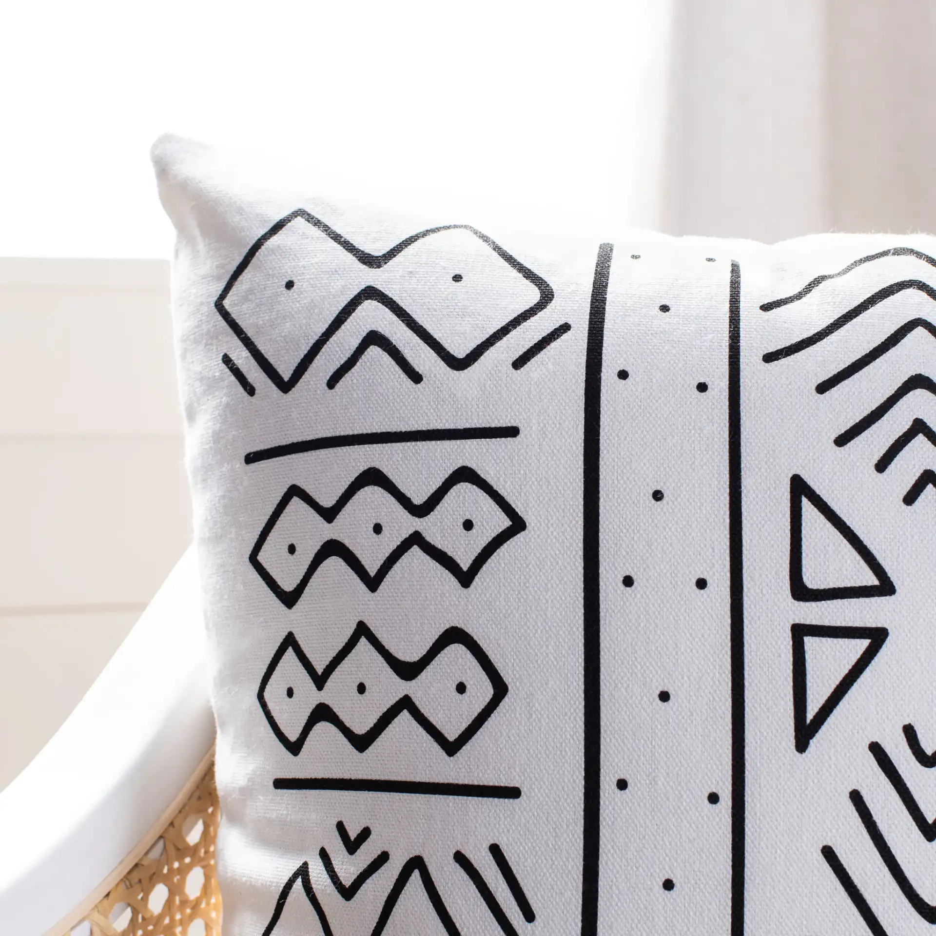 Kerra Pillow in Black / White in a styled room