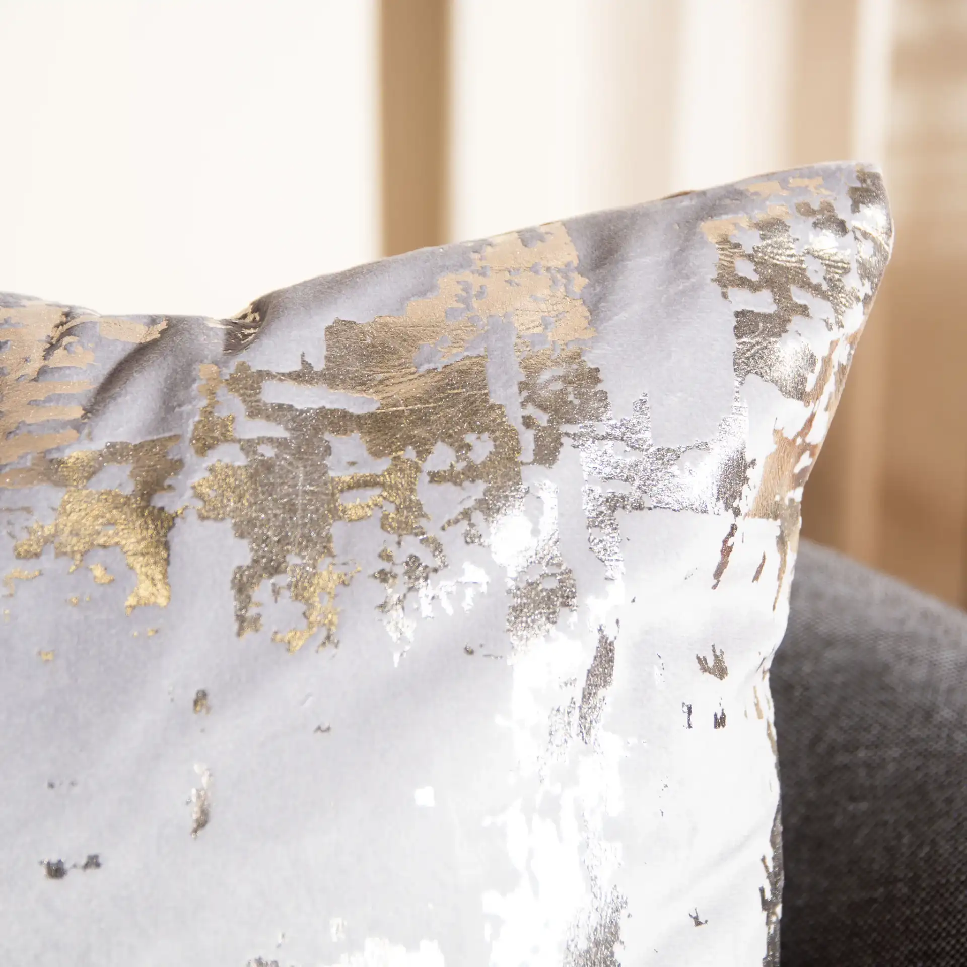 Rensia Pillow in Silver / Beige in a styled room