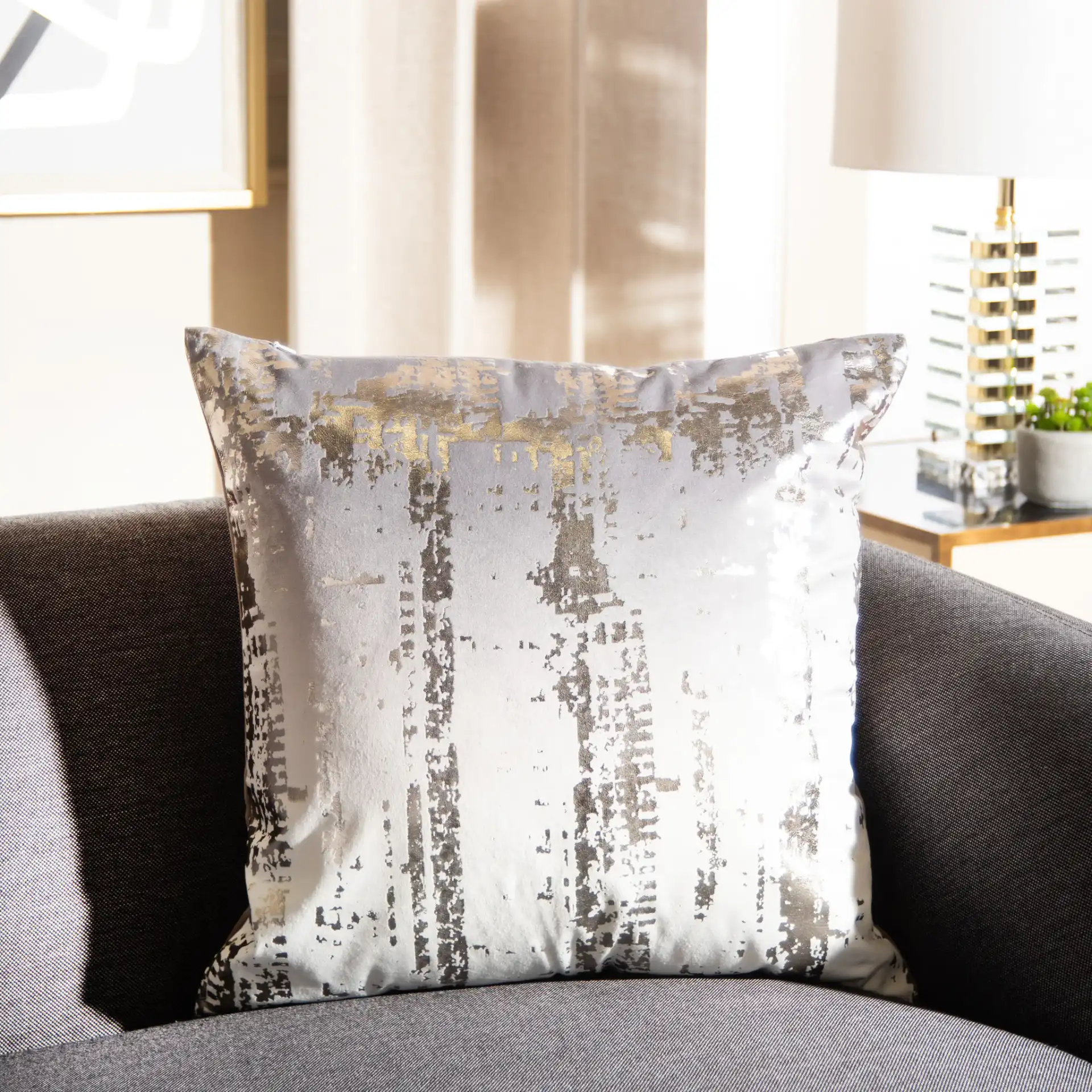 Rensia Pillow in Silver / Beige in a styled room