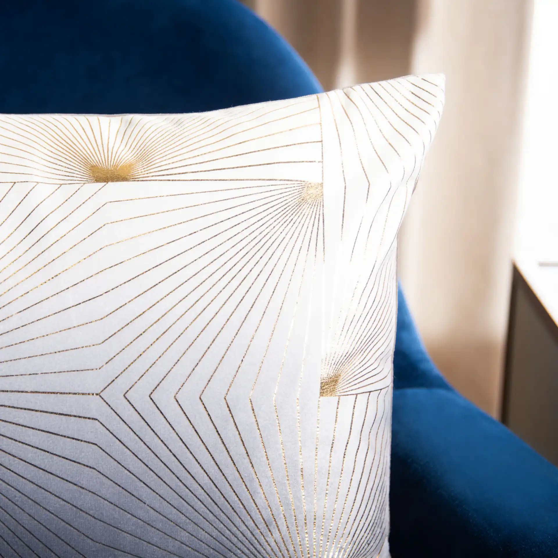 Loran Pillow in Gray / Gold in a styled room