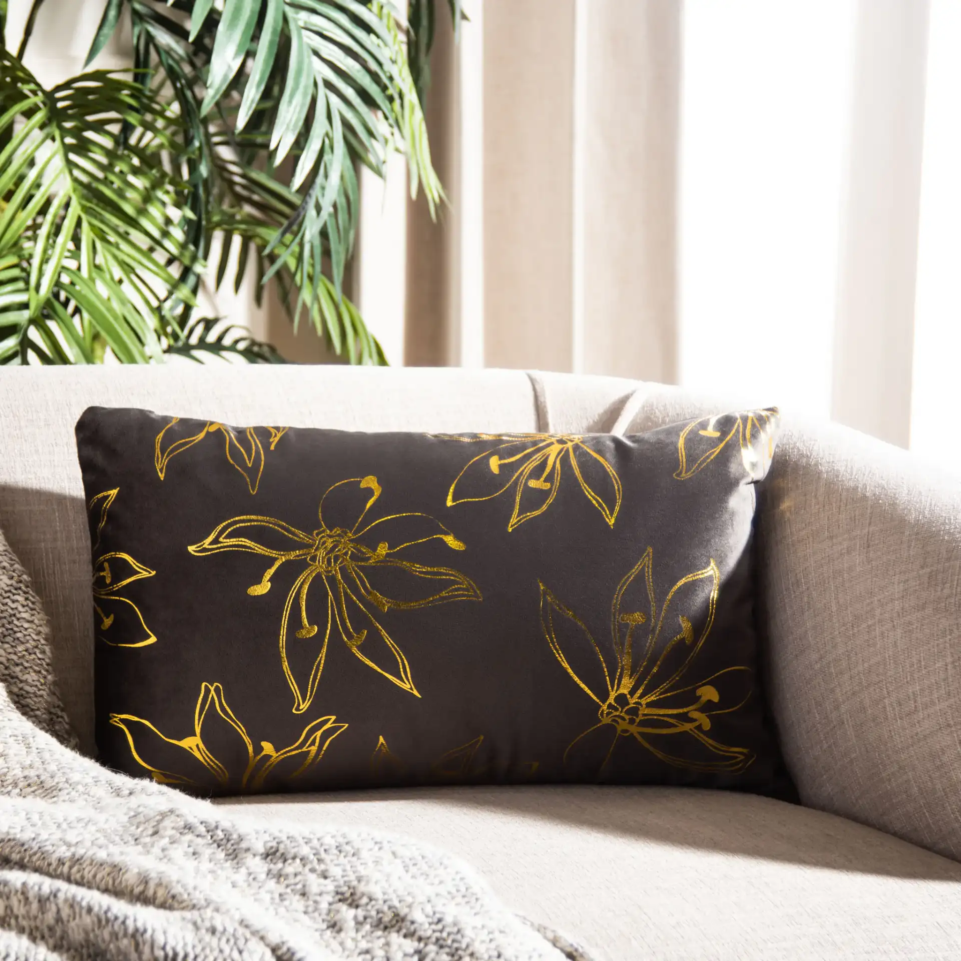 Yari Pillow in Gray / Gold in a styled room