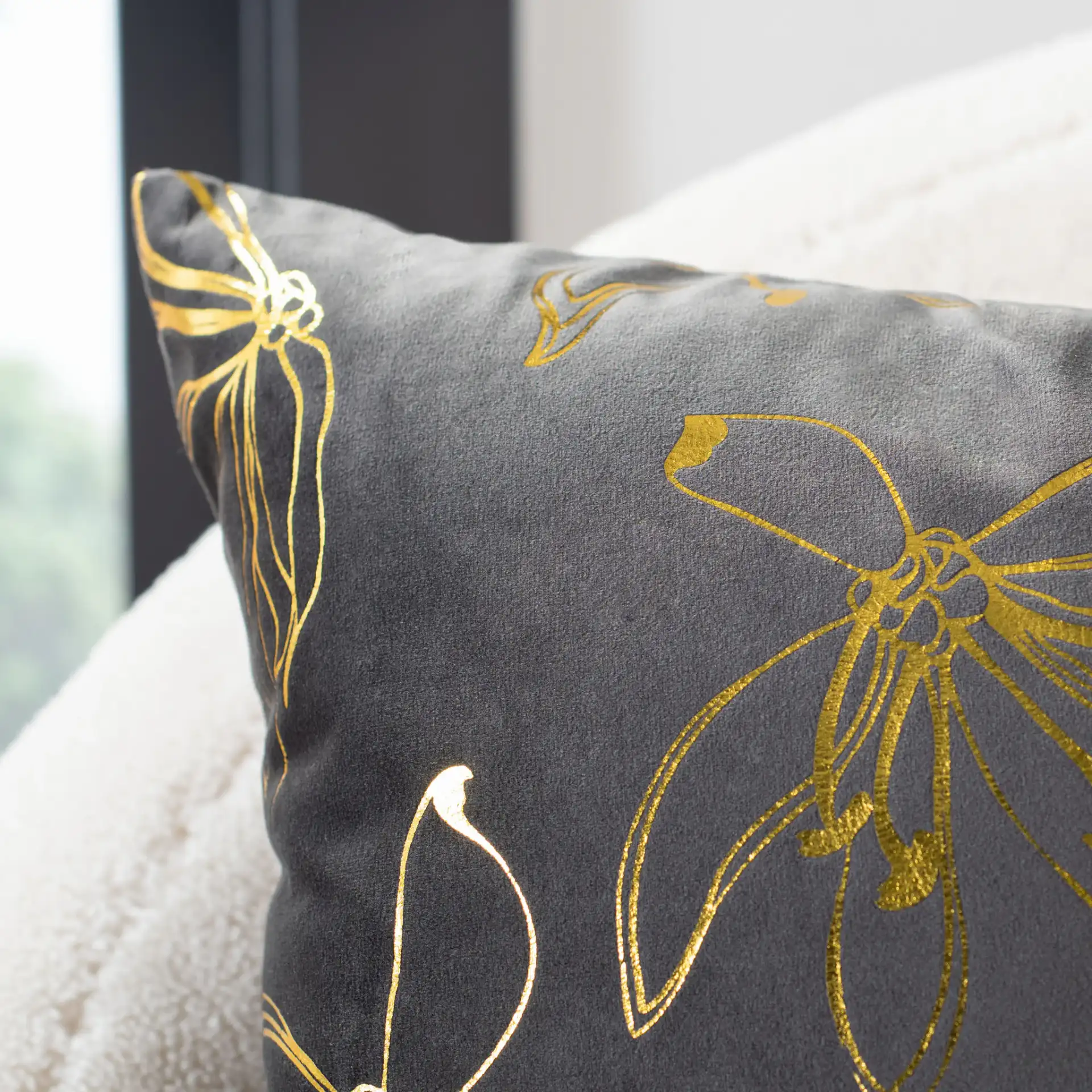 Yari Pillow in Gray / Gold in a styled room