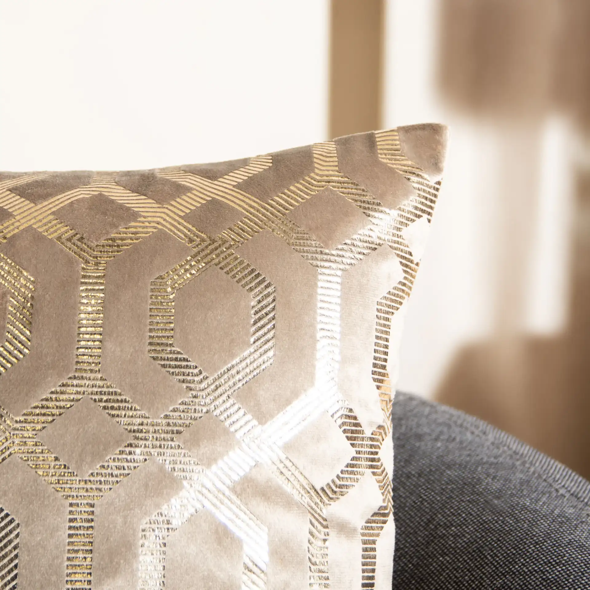 Krema Pillow in Taupe / Gold in a styled room