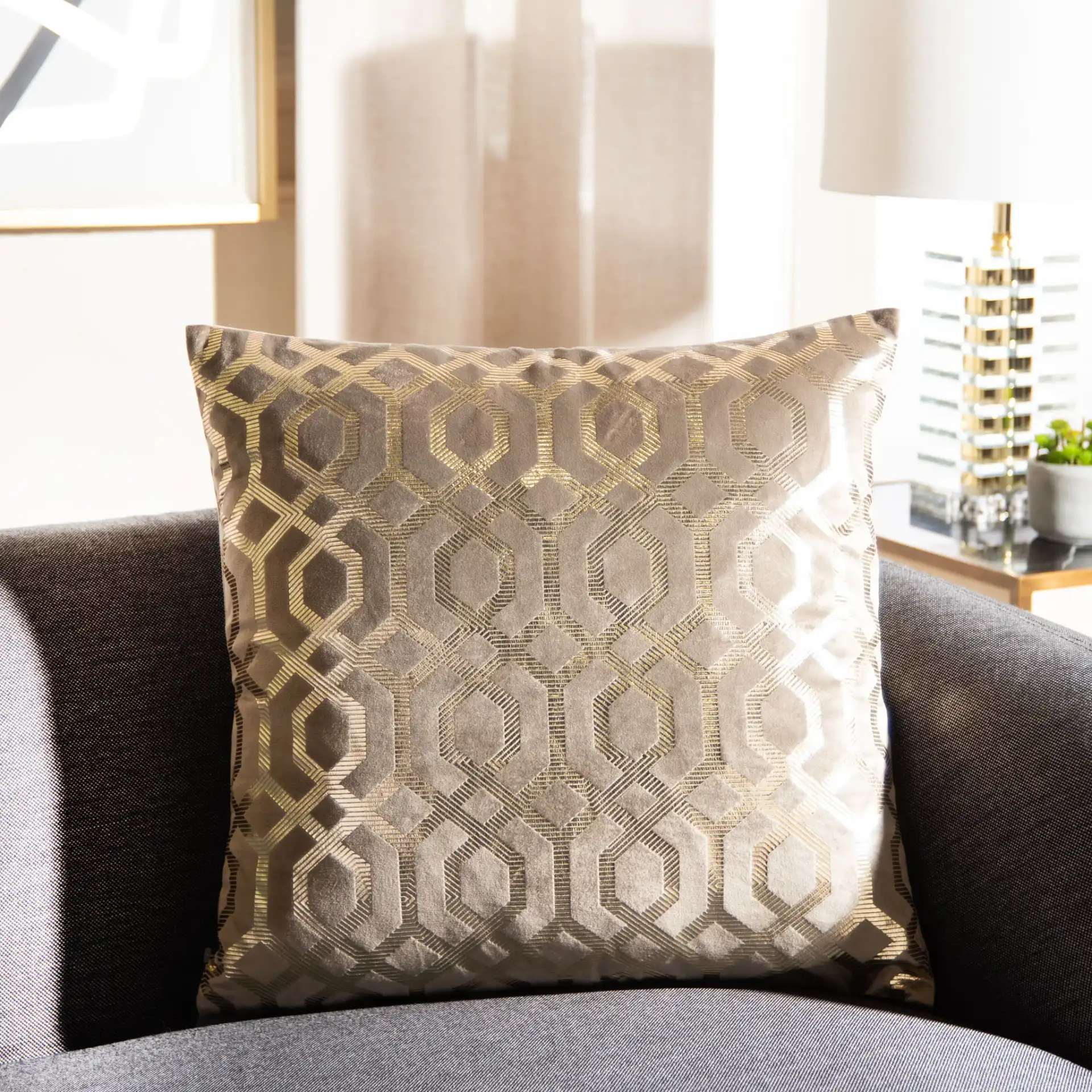 Krema Pillow in Taupe / Gold in a styled room