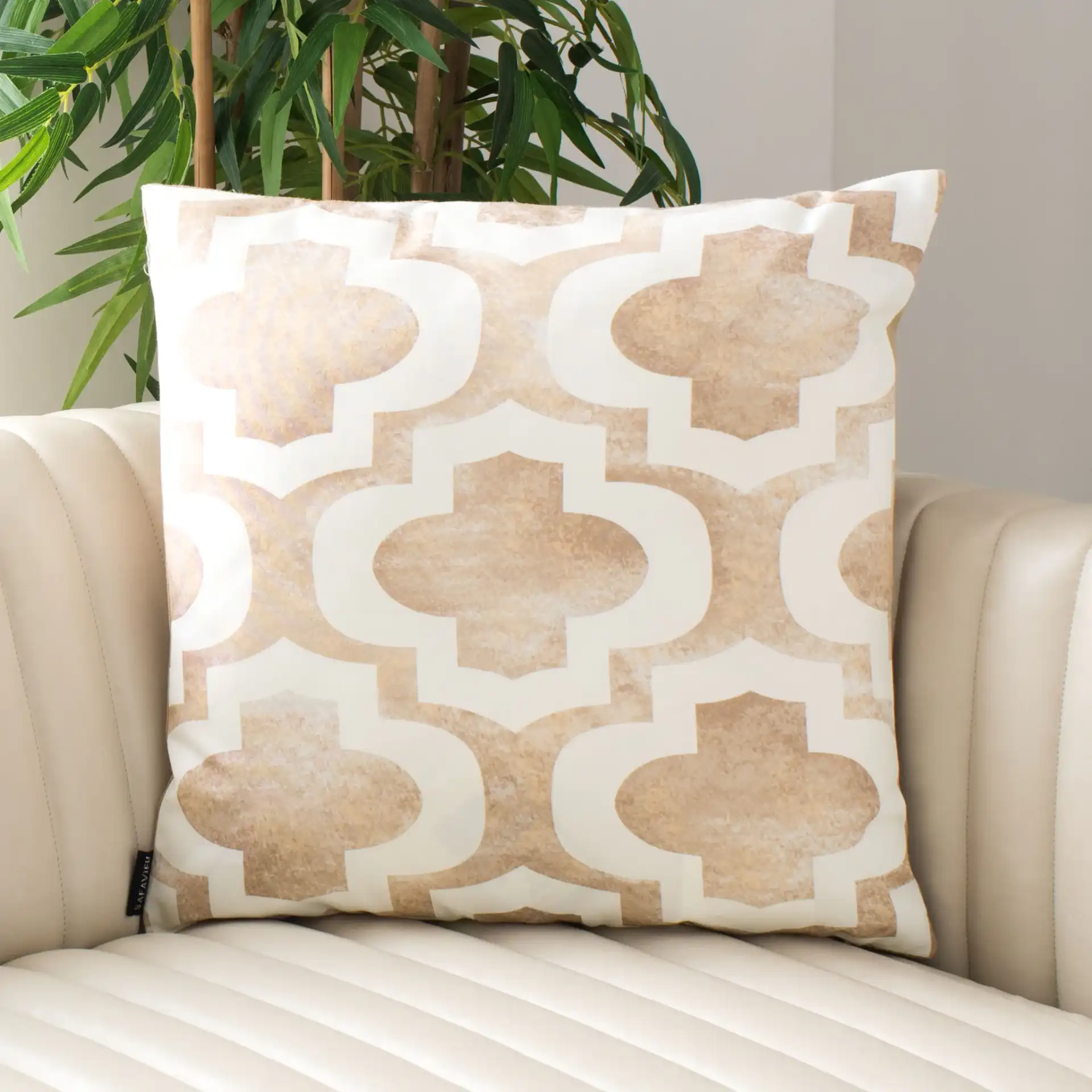 Velie Pillow in Beige / White in a styled room