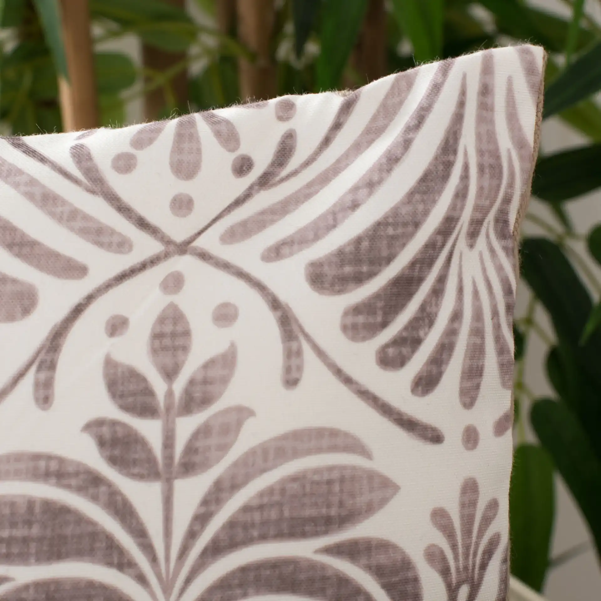 Marala Pillow in Beige / White in a styled room
