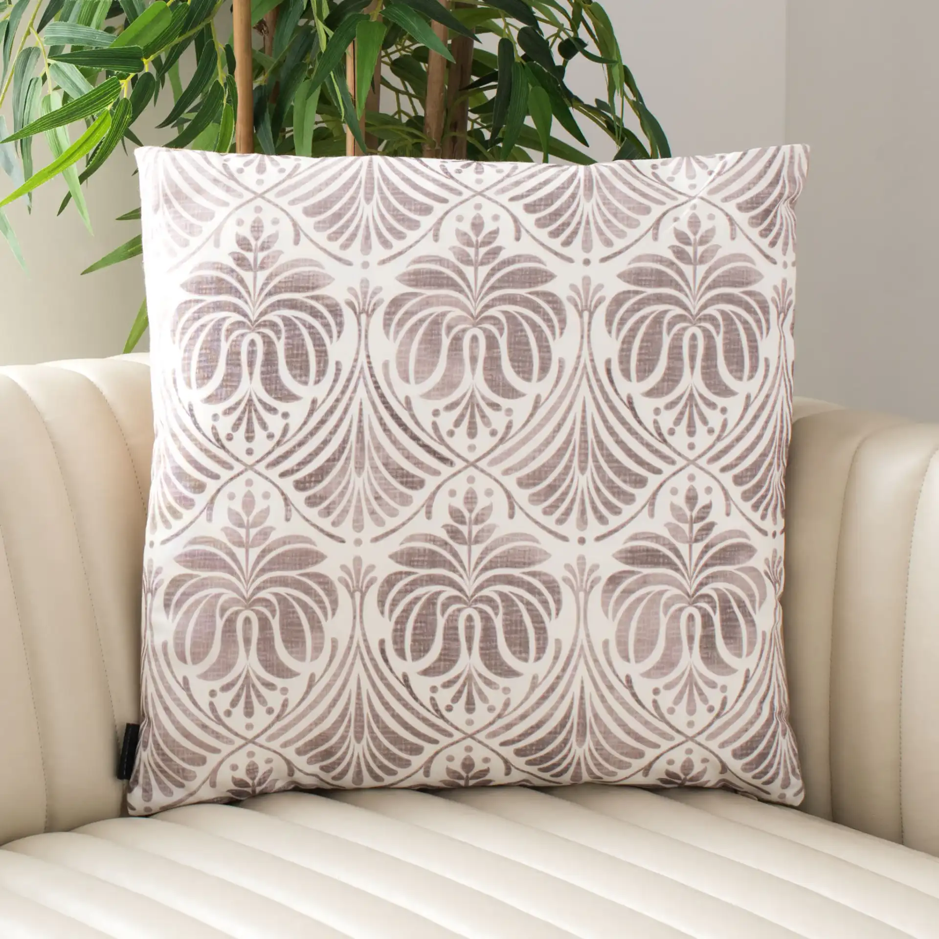 Marala Pillow in Beige / White in a styled room