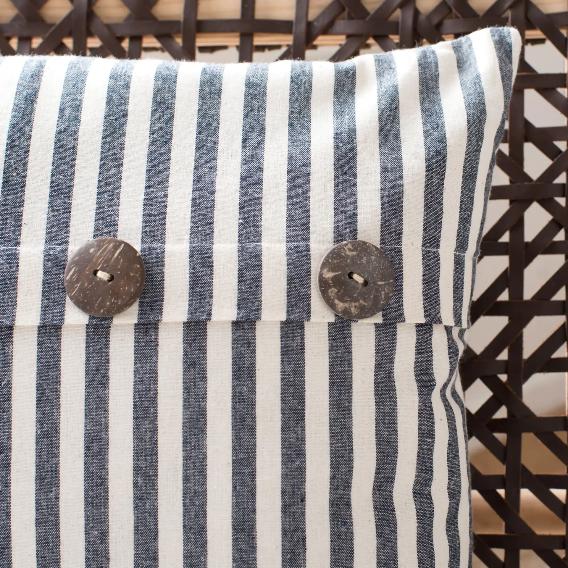 Kensing Pillow in Navy / White in a styled room