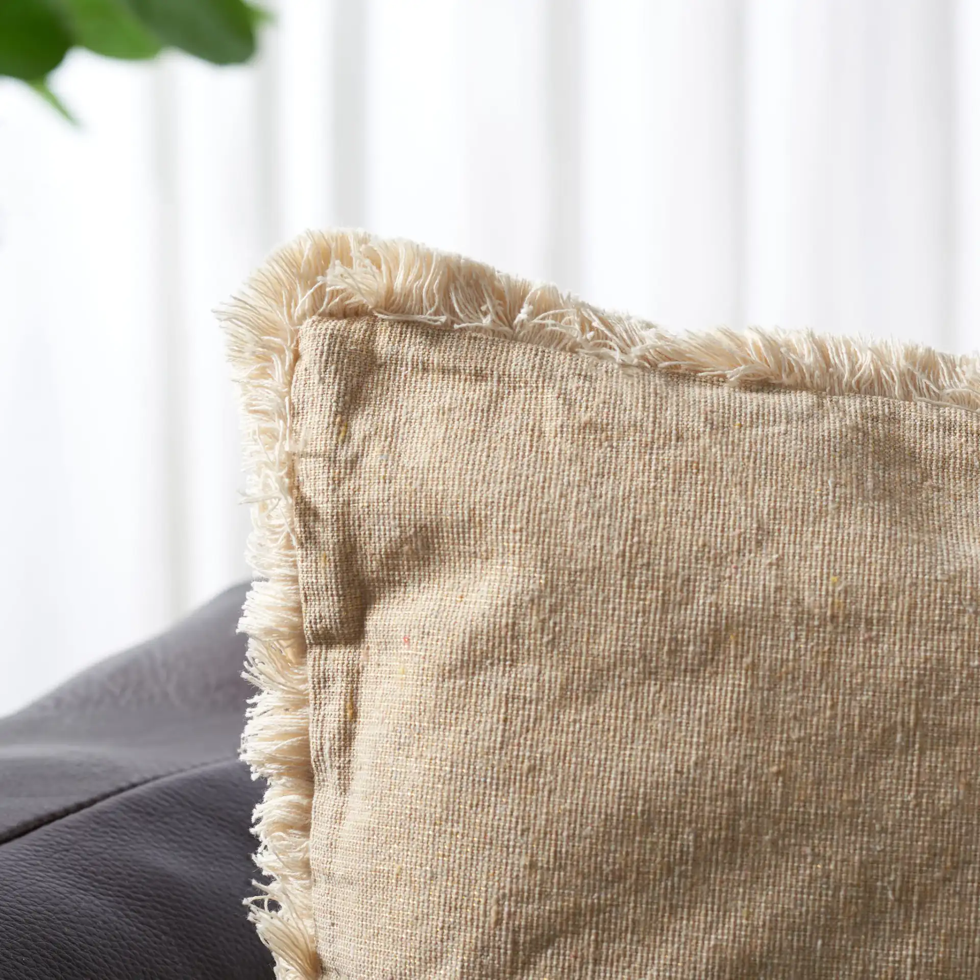 Rinley Pillow in Beige / White in a styled room