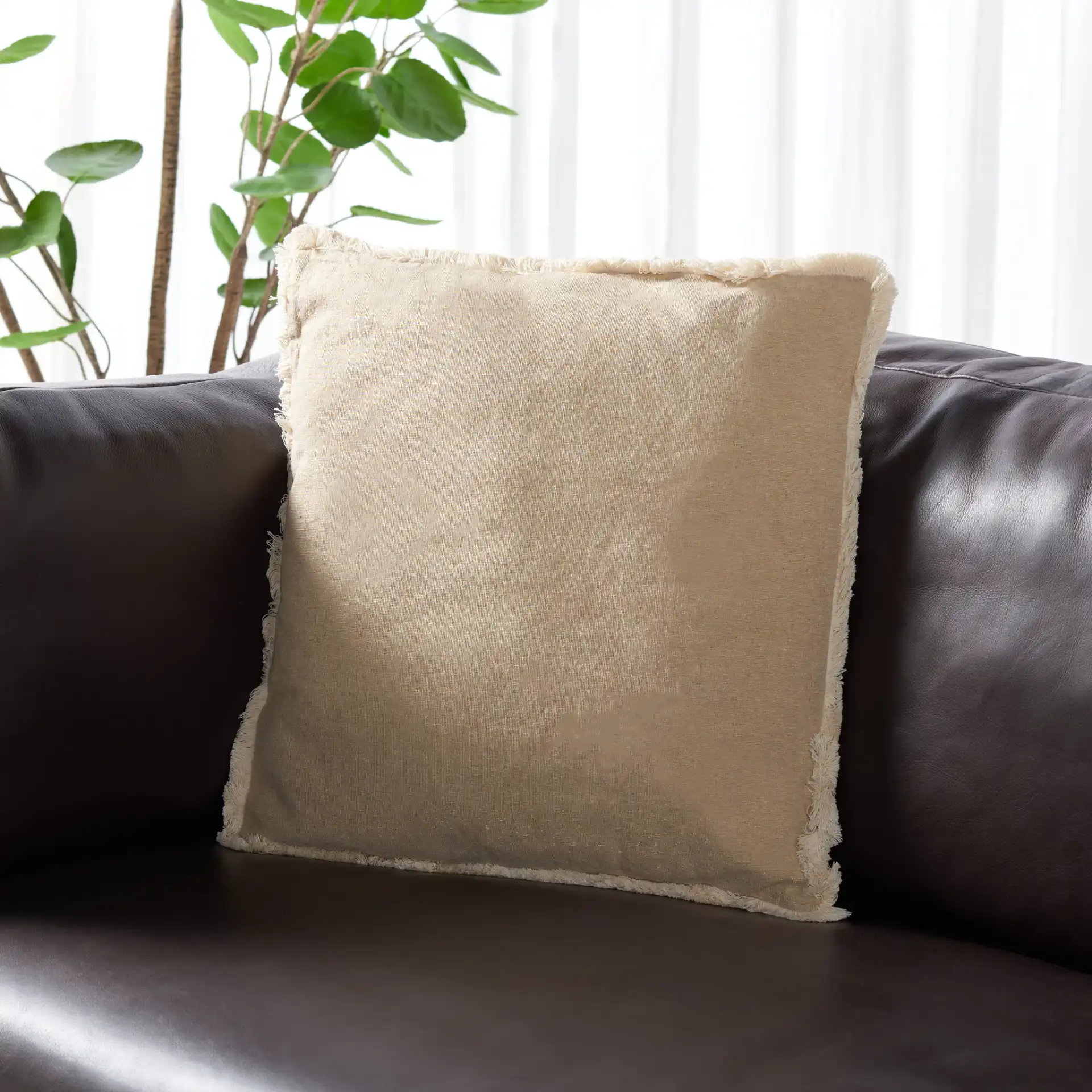 Rinley Pillow in Beige / White in a styled room