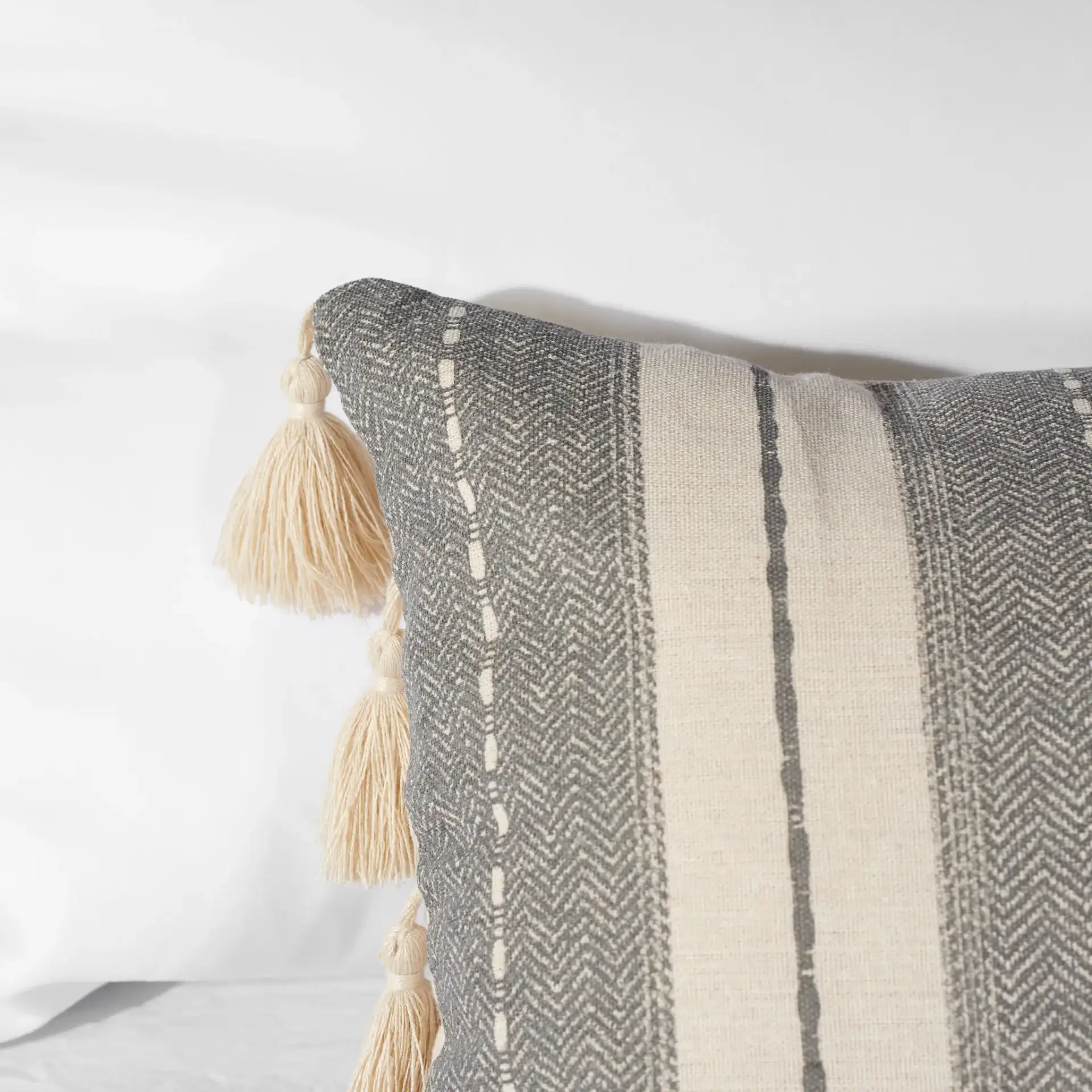Samerin Pillow in Gray / Beige in a styled room
