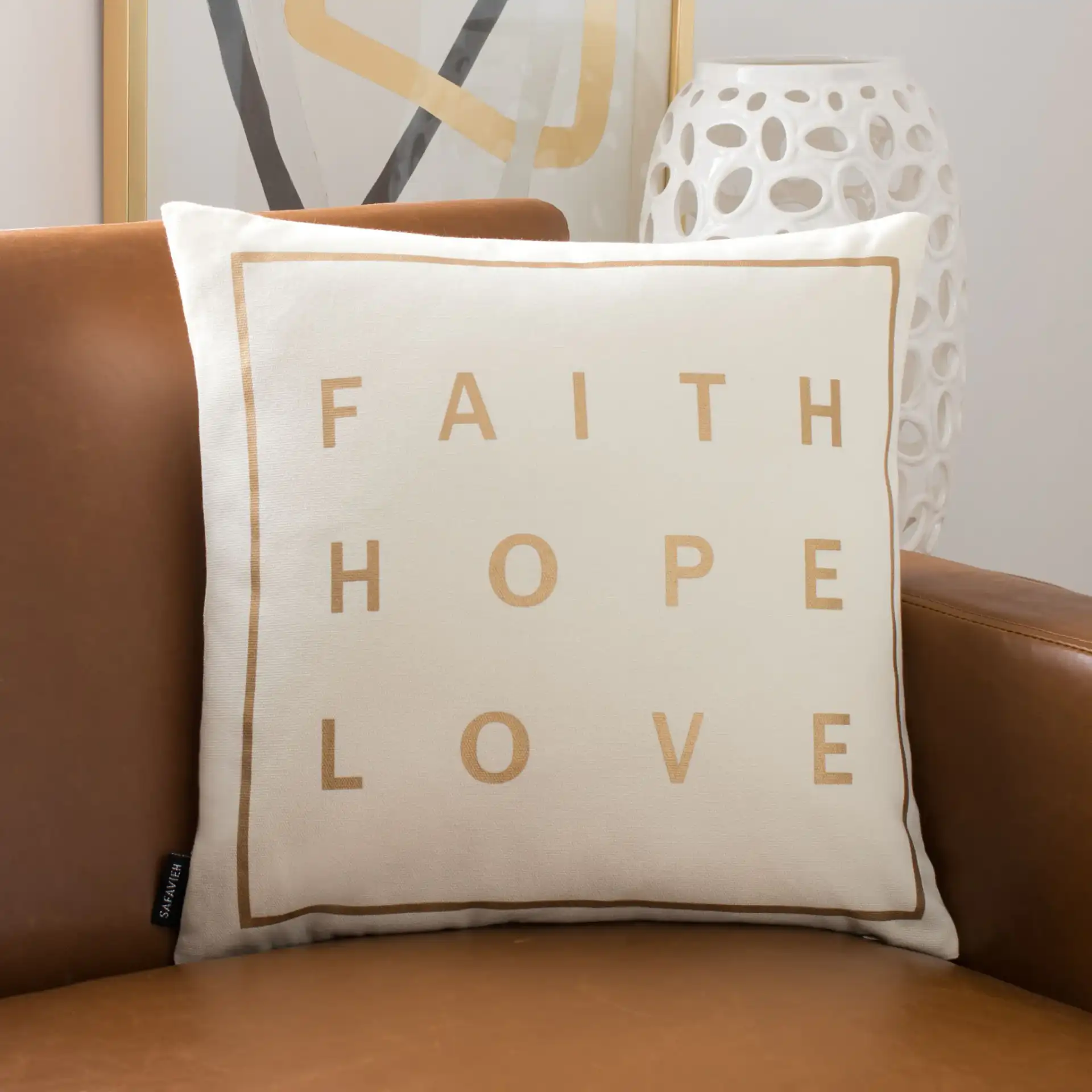 Faith Pillow in Beige / Gold in a styled room
