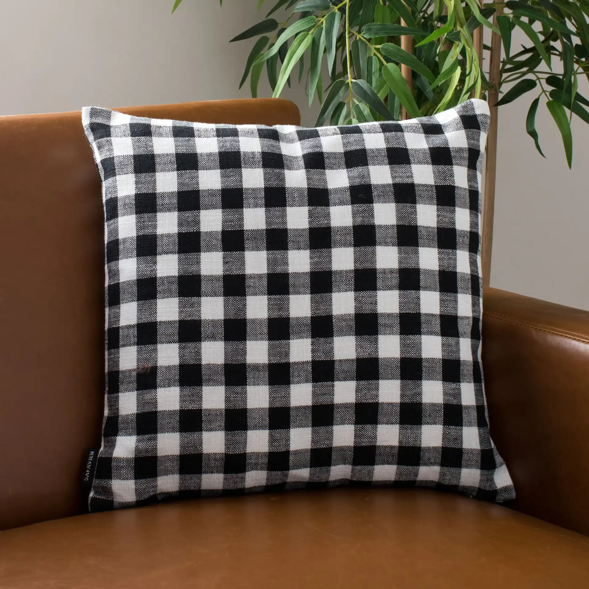 Autumn Pillow in Beige / Black in a styled room
