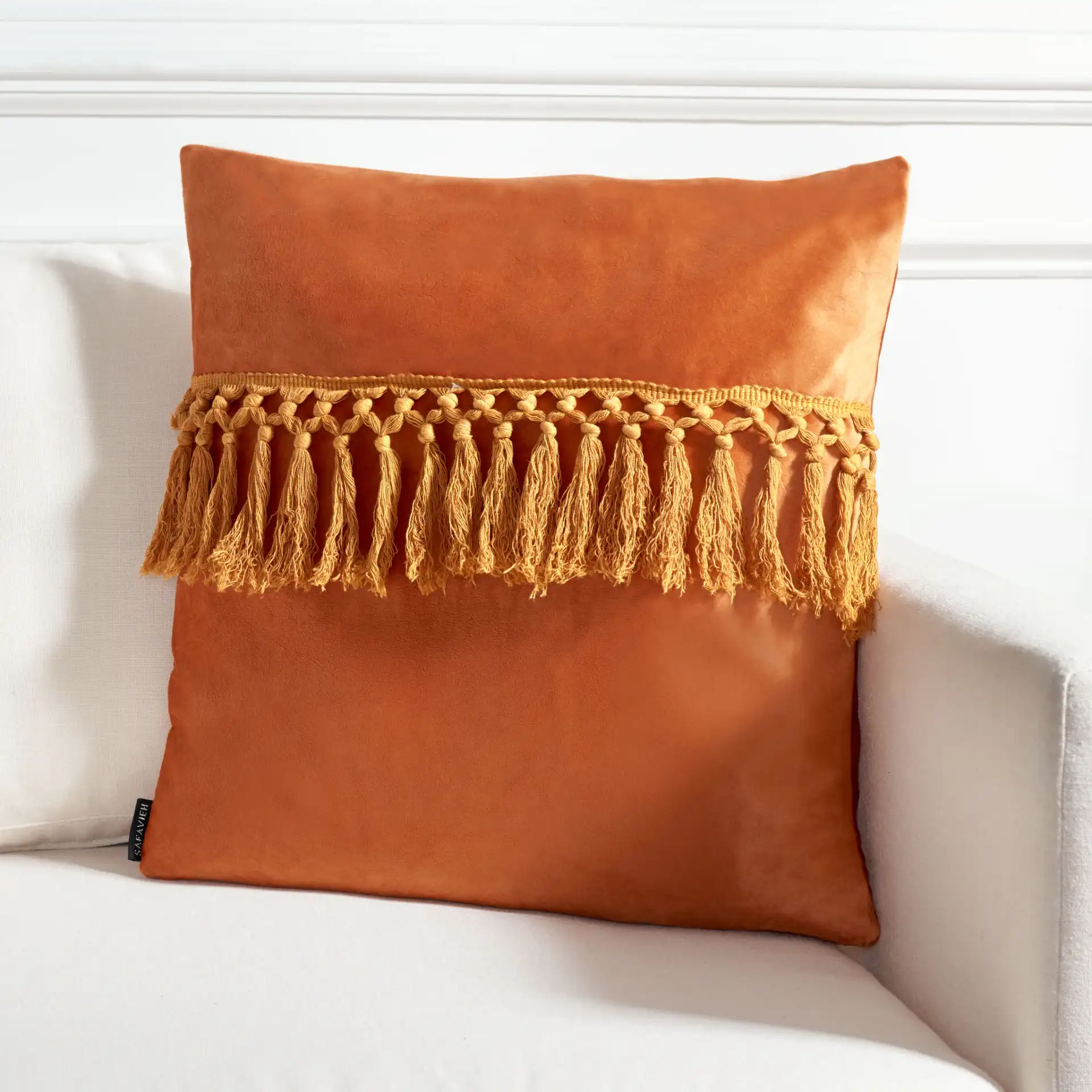 Anaster Pillow in Orange in a styled room