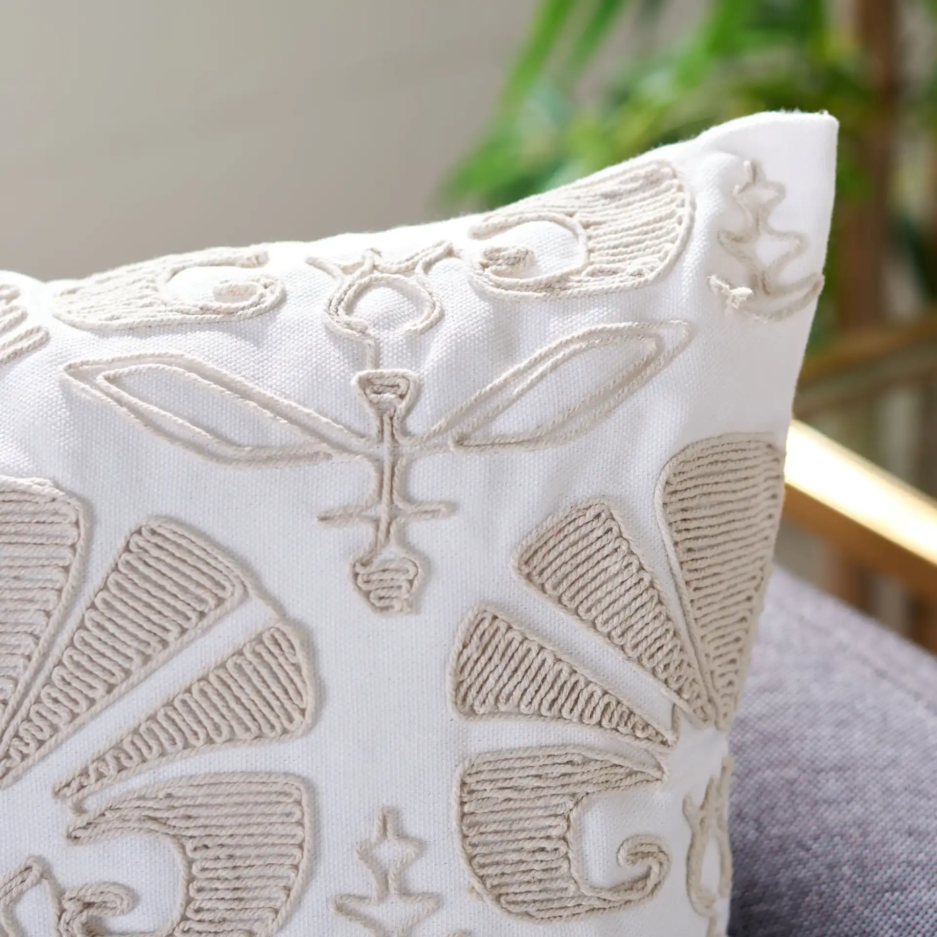 Florini Pillow in Beige in a styled room