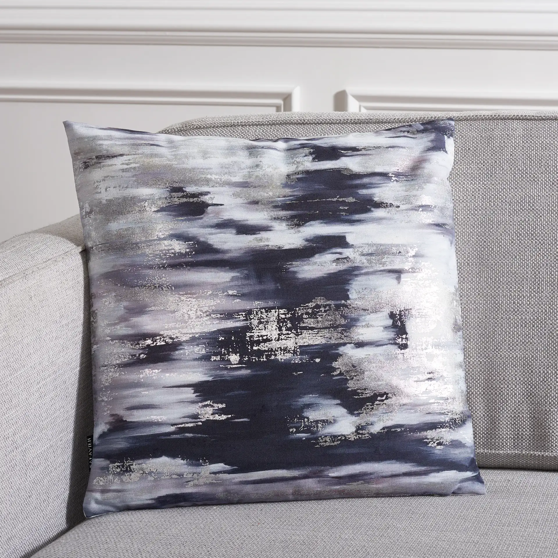 Andrine Pillow in Silver / Navy in a styled room