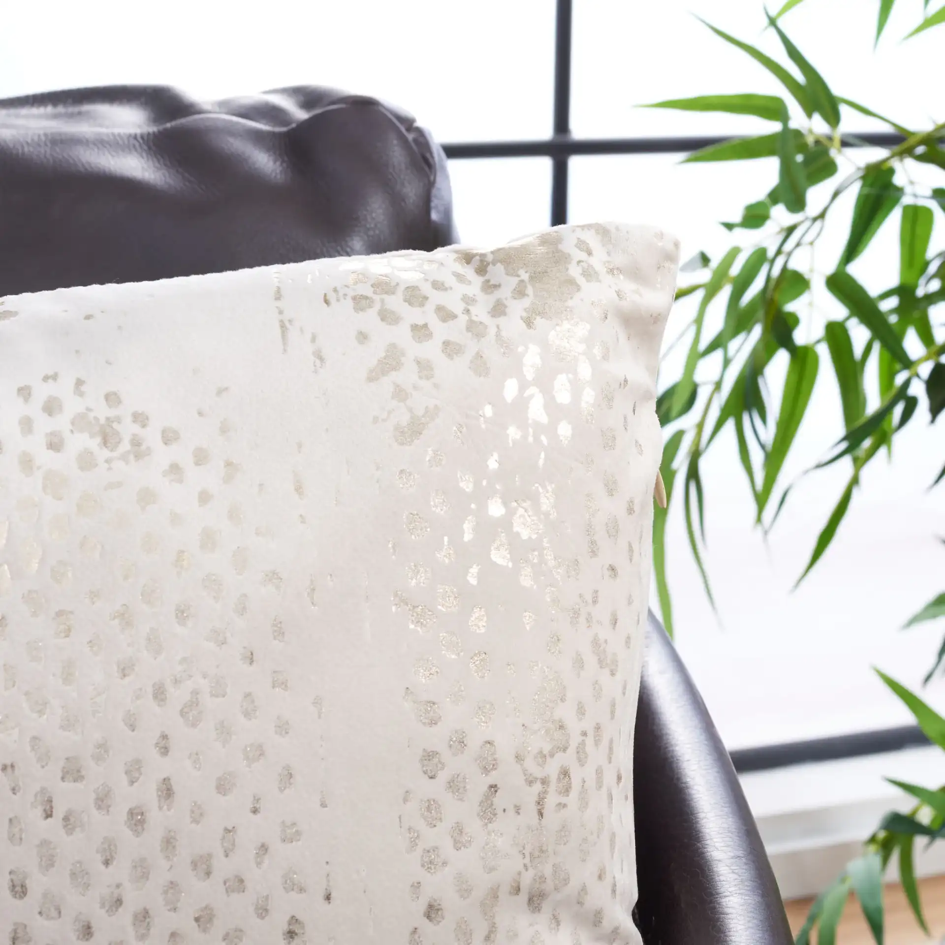 Emiliana Pillow in Gold / Beige in a styled room