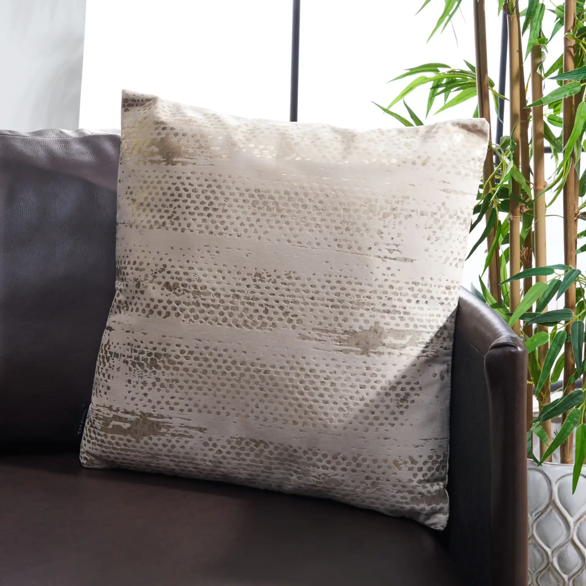 Emiliana Pillow in Gold / Beige in a styled room