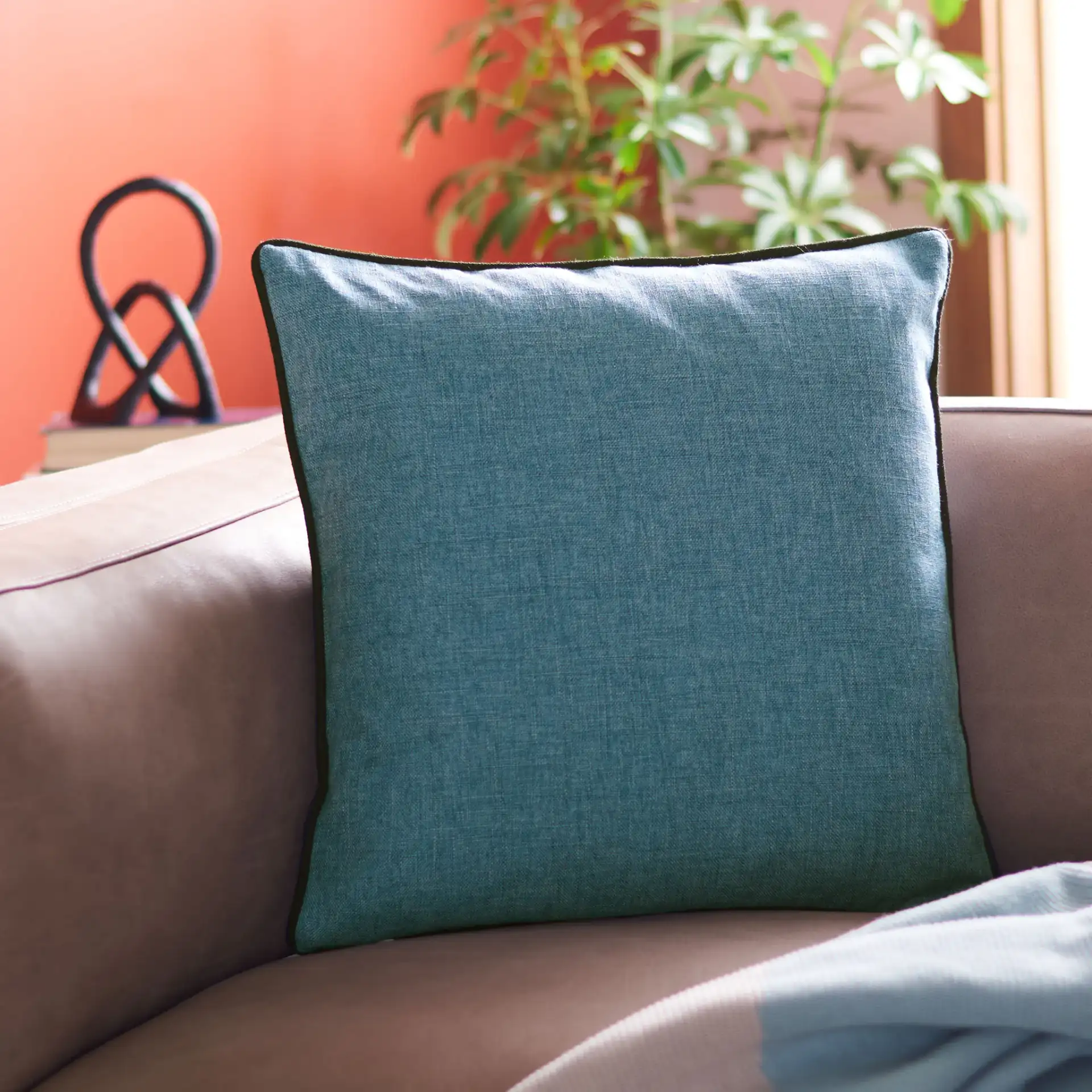 Edeline Pillow in Blue in a styled room