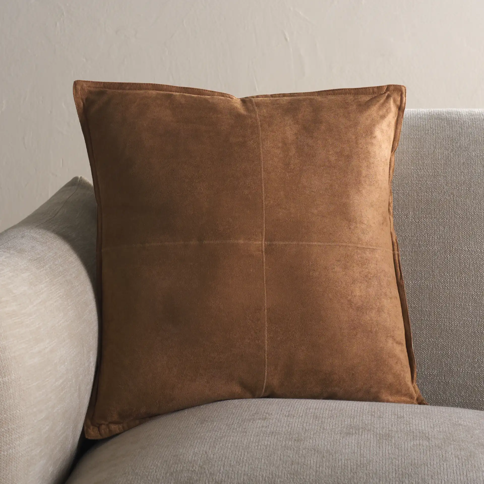Karya Pillow in Camel in a styled room