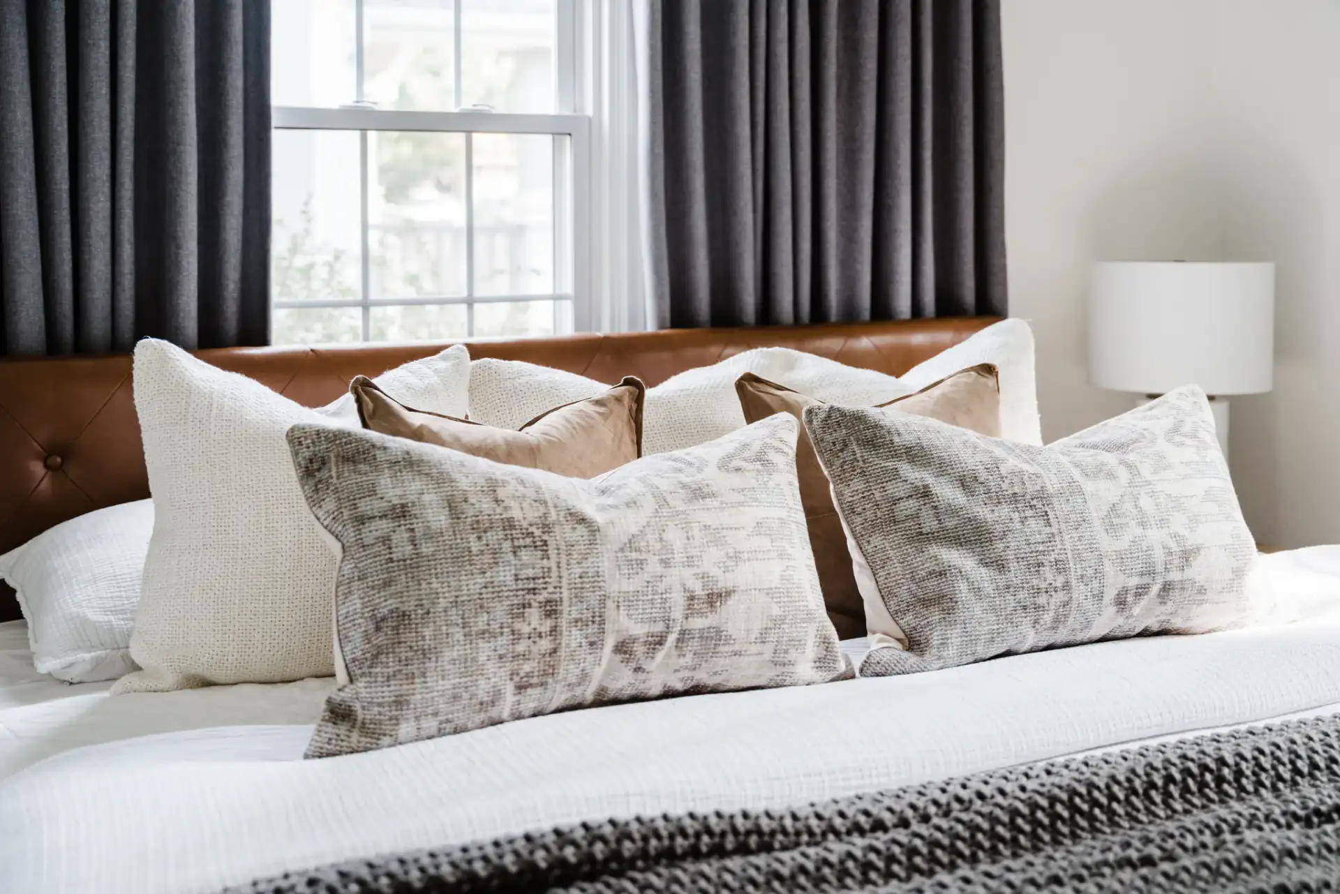 Karya Pillow in Camel in a styled room