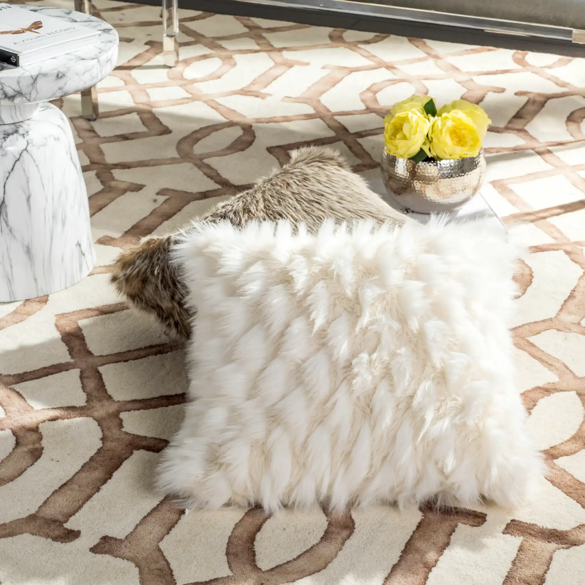 Luxe Feather Pillow in White in a styled room