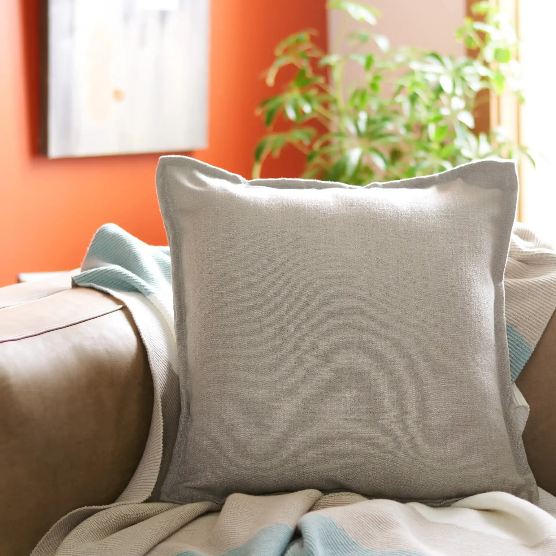 Jyana Pillow in Gray in a styled room
