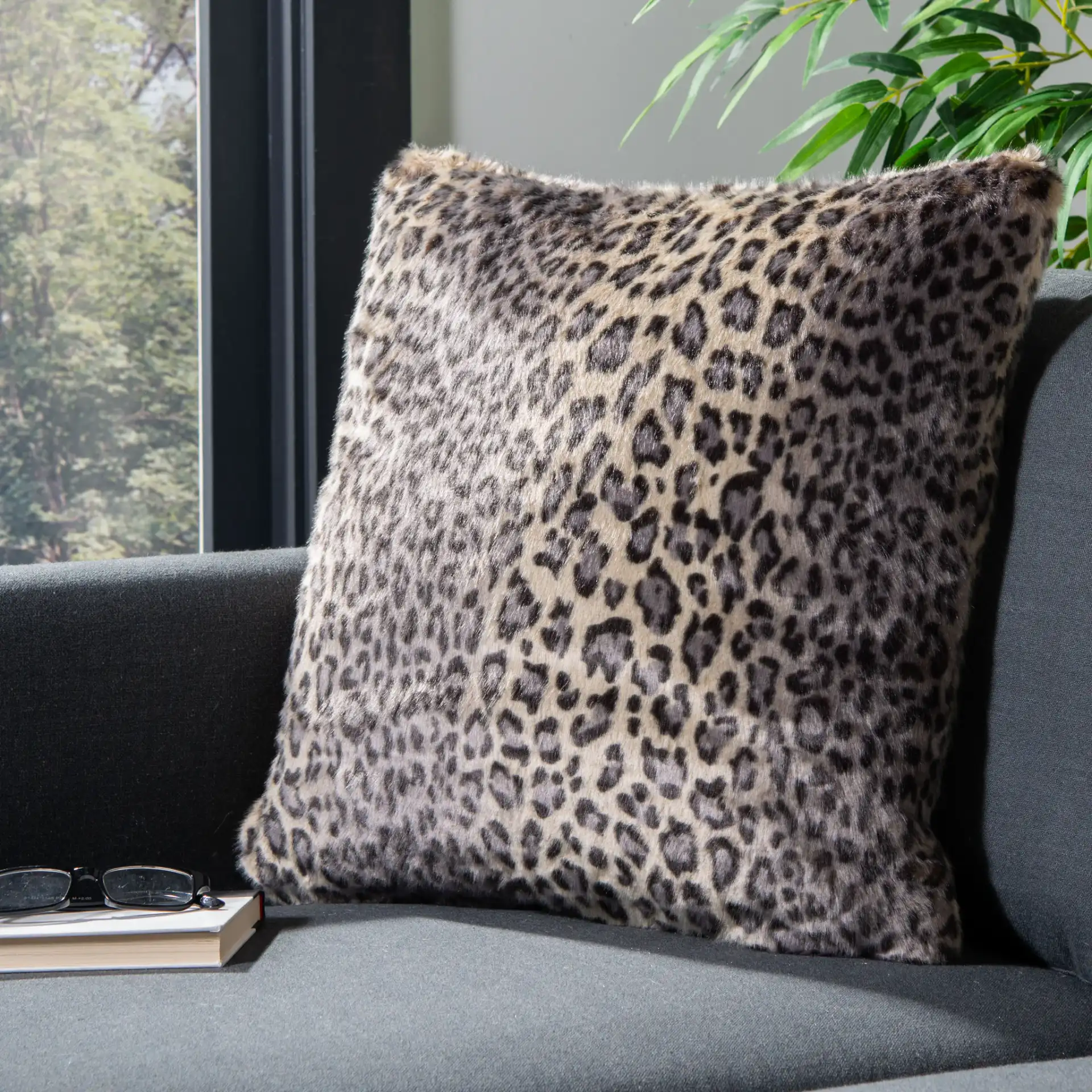 Faux Black Leopard Pillow in Leopard in a styled room