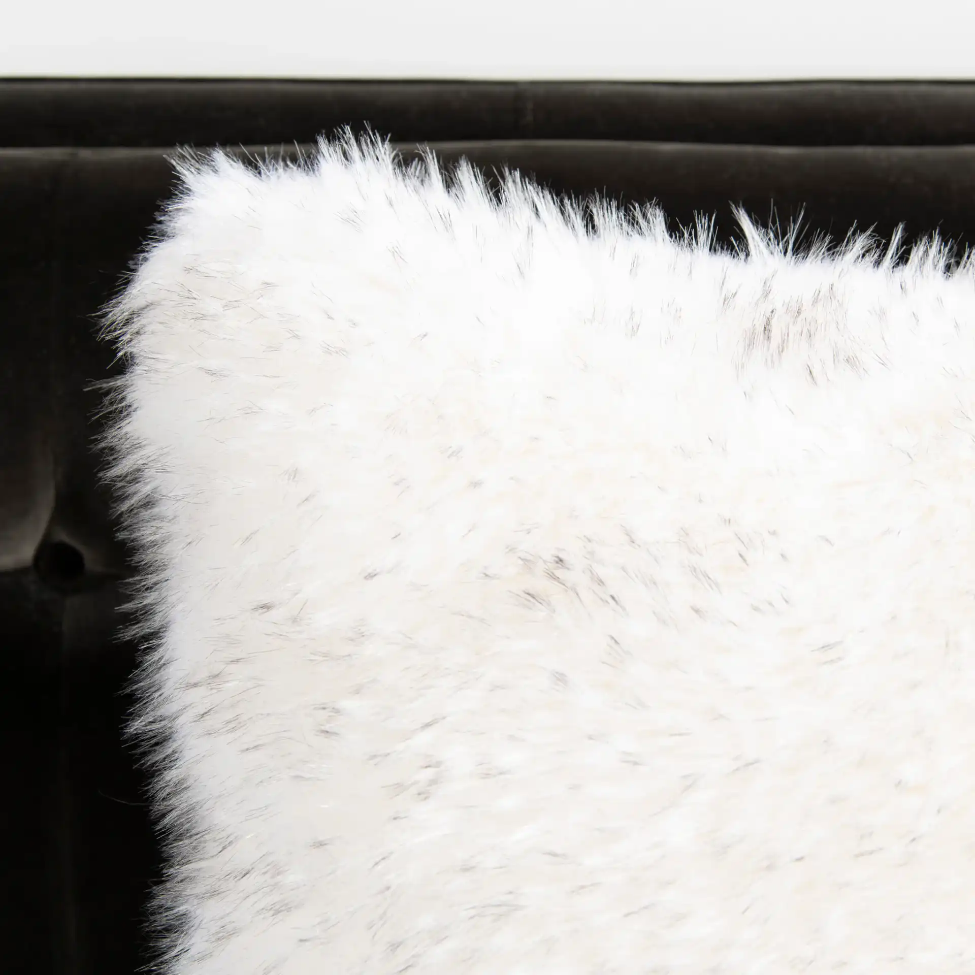 Faux Dalmatian Tips Pillow in Milk Chocolate in a styled room