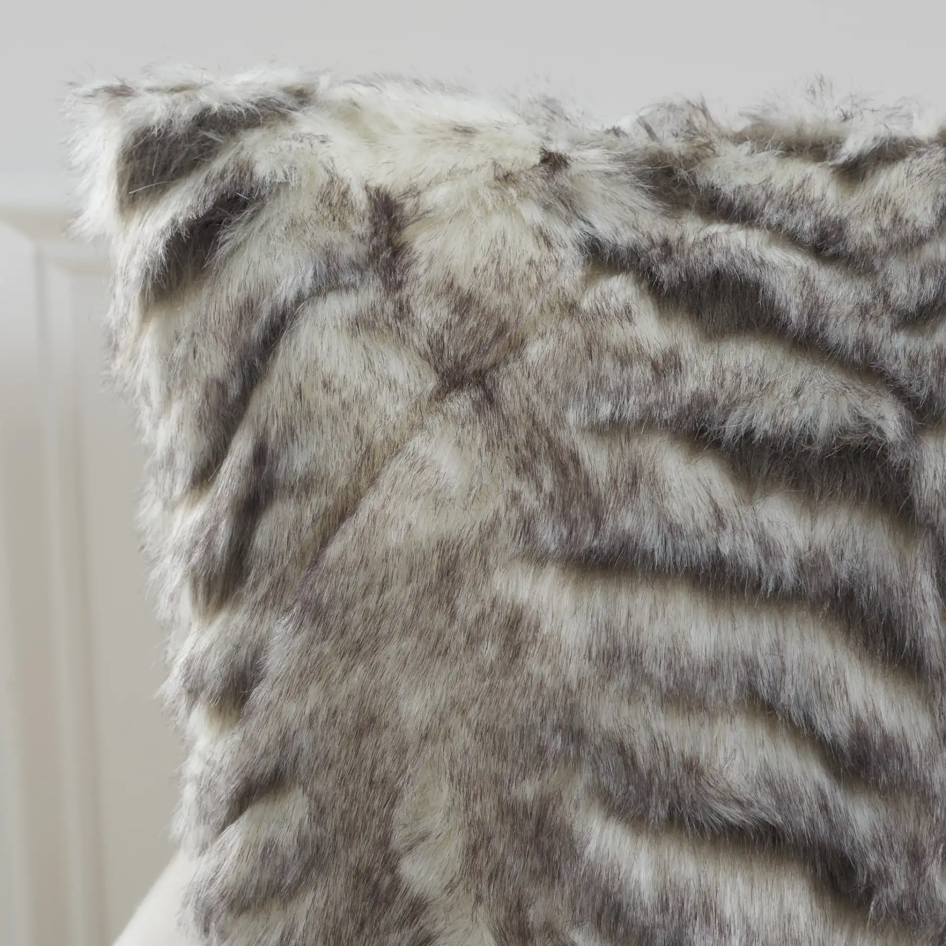 Adalet Fur Pillow in Multicolor in a styled room