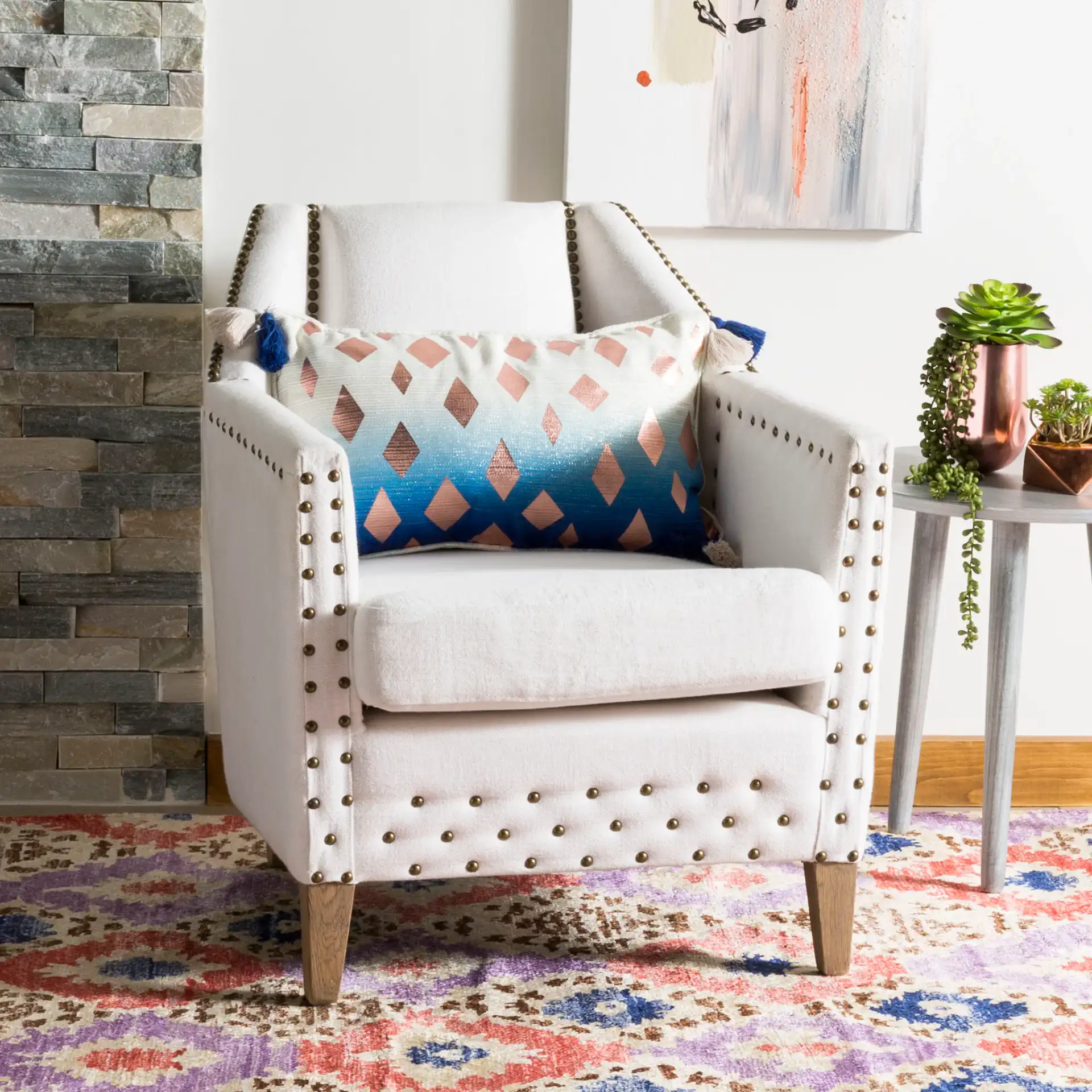 Roma Pillow in Multi in a styled room
