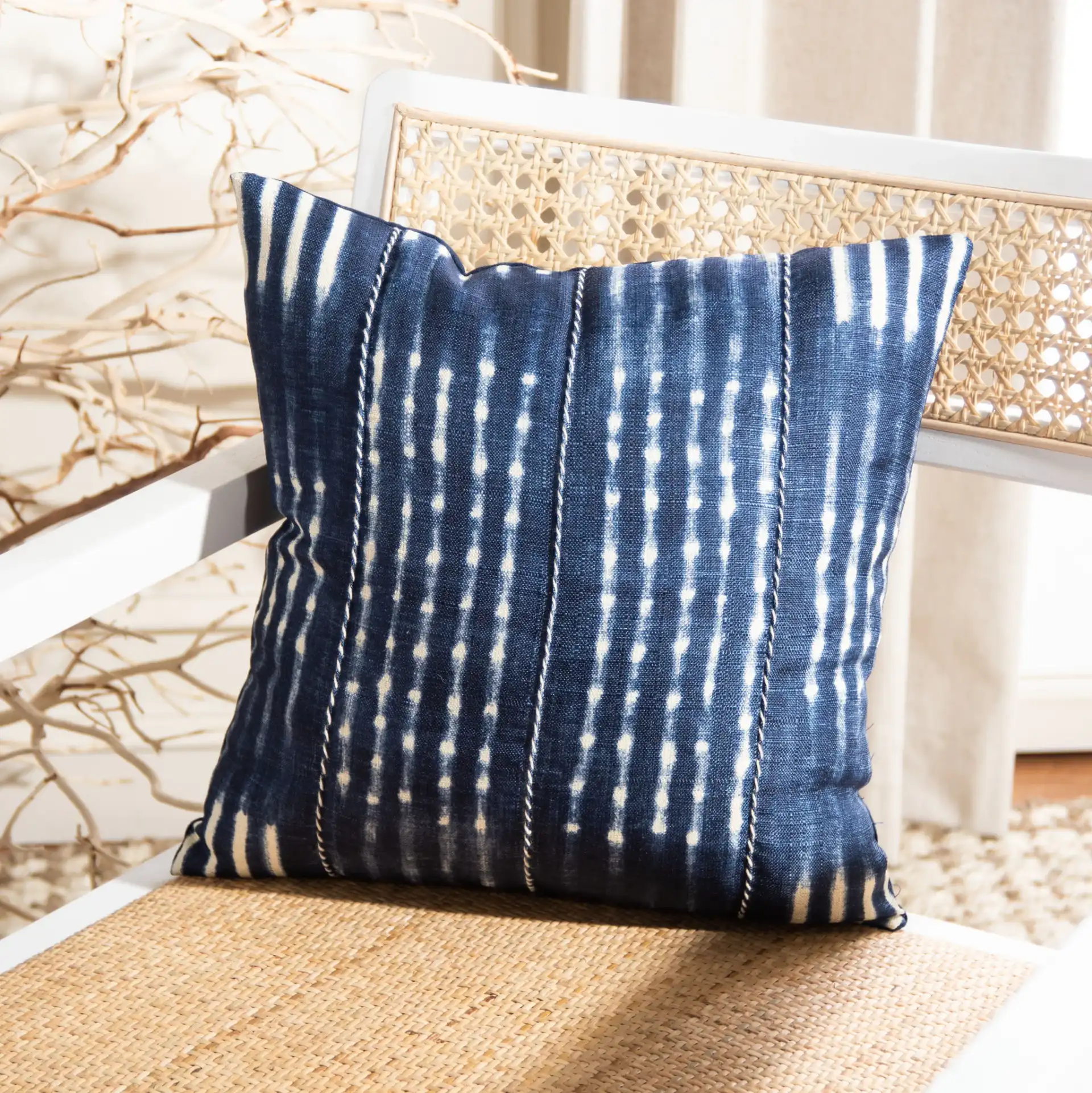 Laurena Pillow in Blue / Cream in a styled room