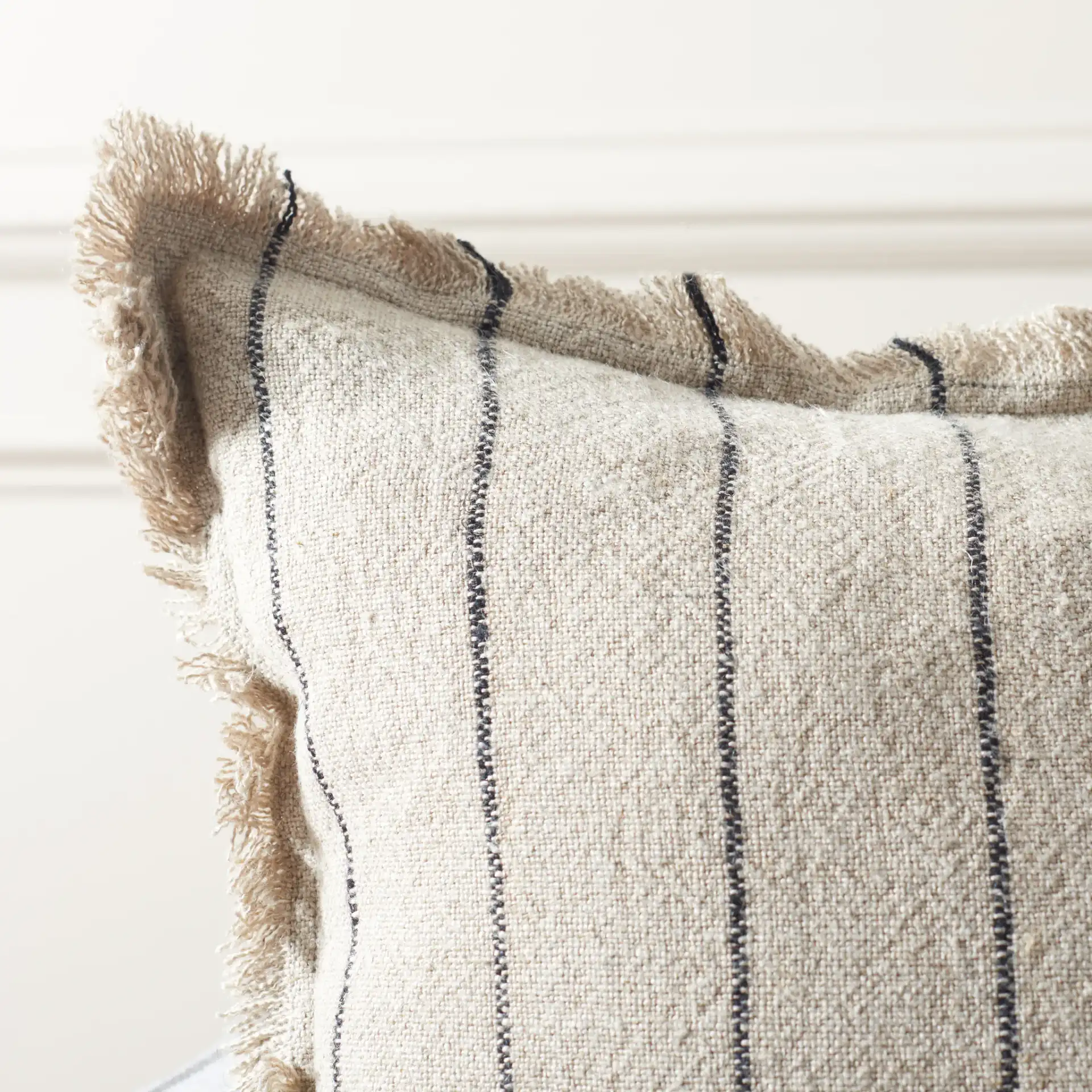 Mckay 20X20 Pillow in Natural / Black in a styled room