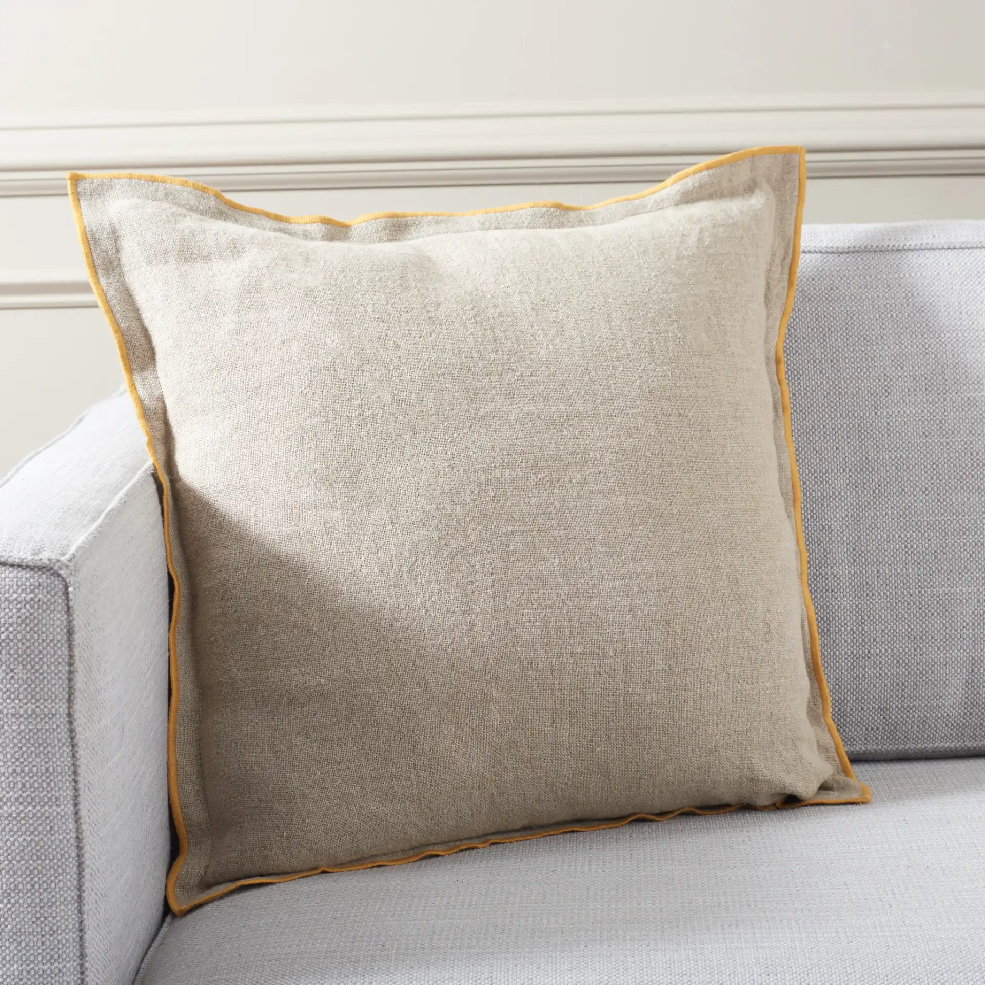 Amal 20X20 Pillow in Natural / Mustard in a styled room