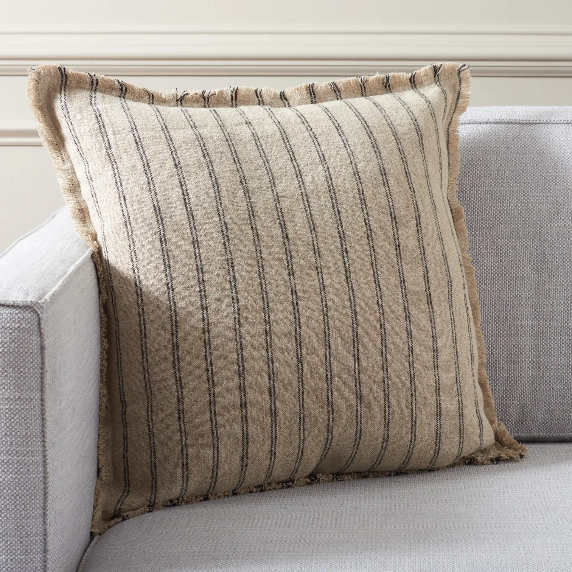 Arden 20X20 Pillow in Natural / Black in a styled room