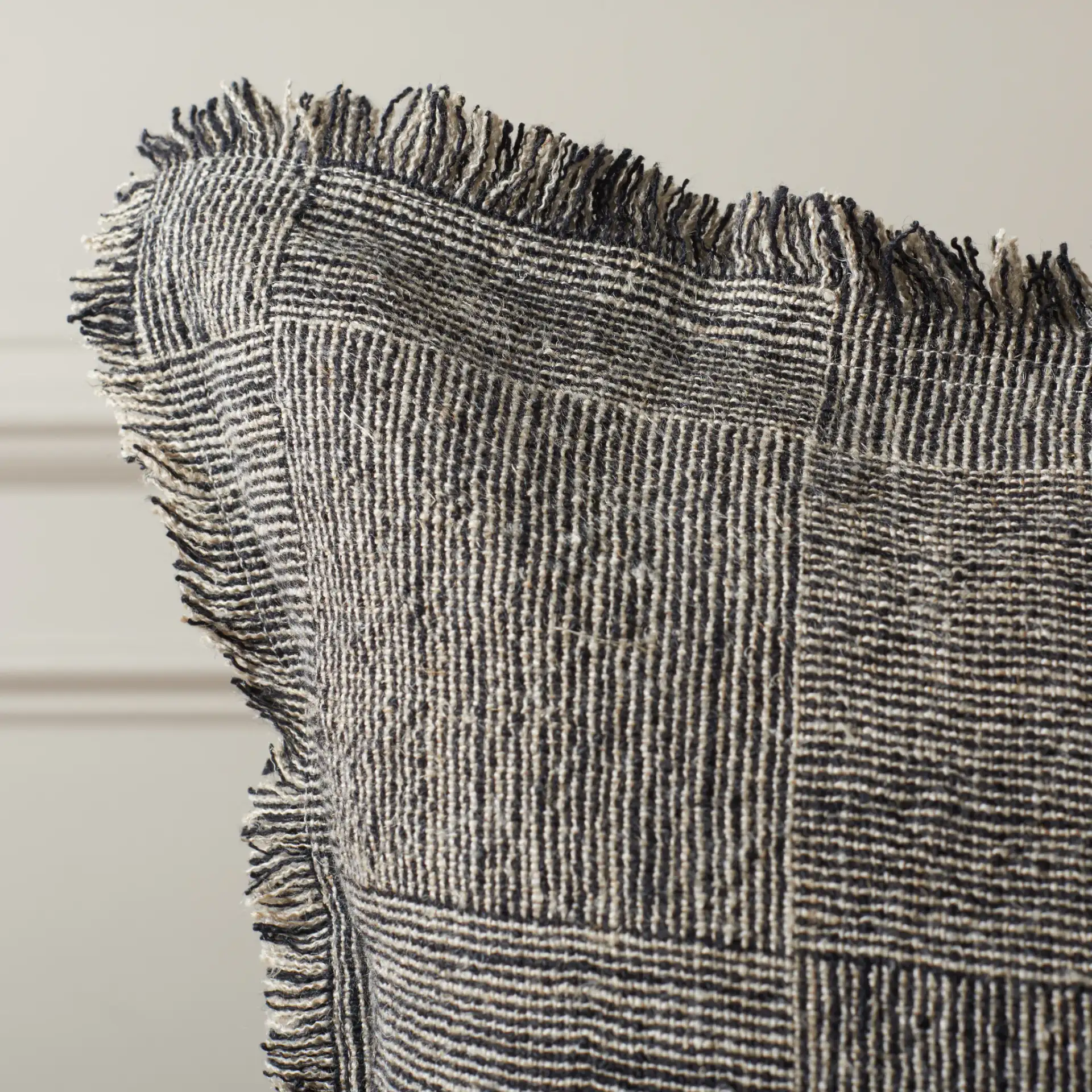 Terra 20X20 Pillow in Black / Natural in a styled room