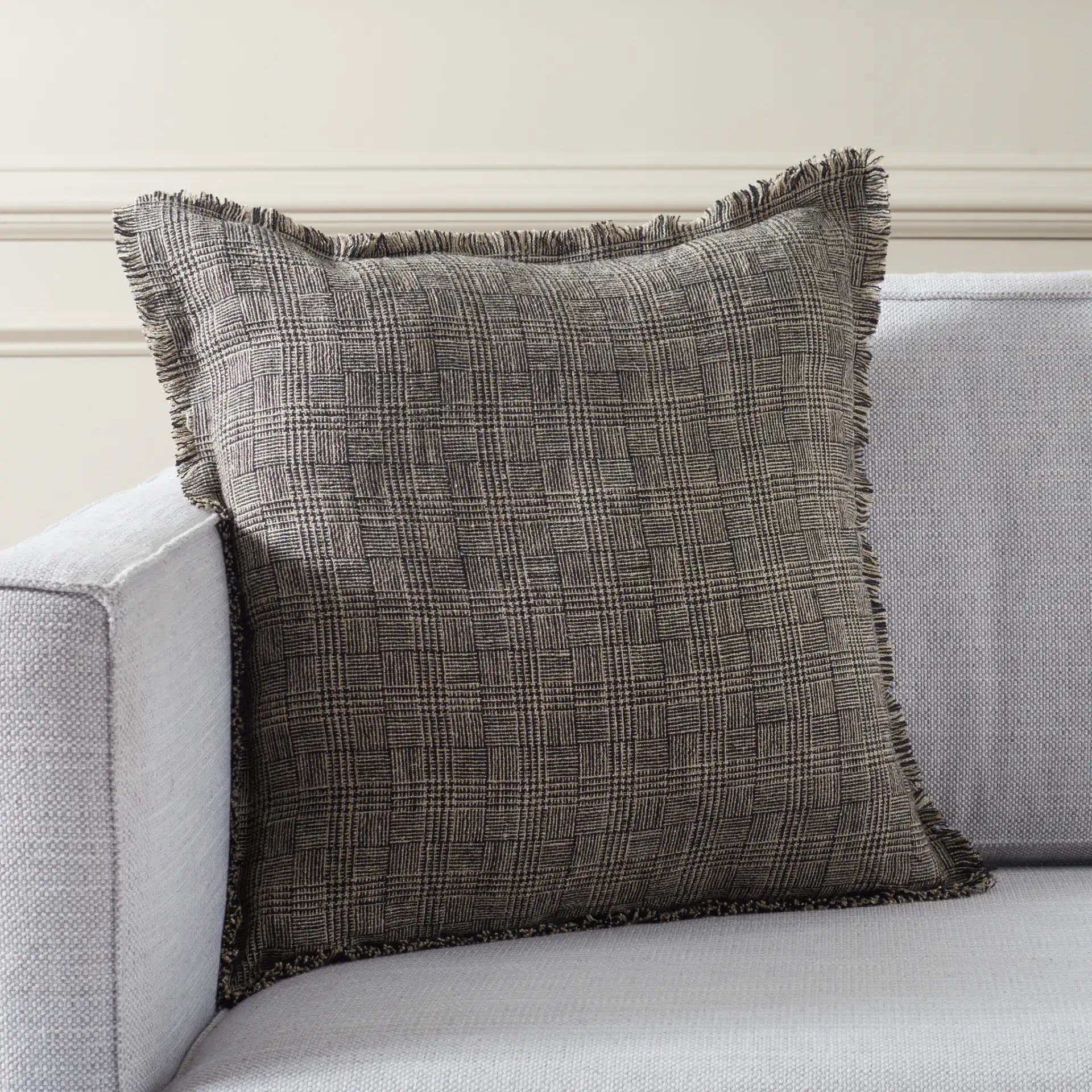 Inara 20X20 Pillow in Black / Natural in a styled room