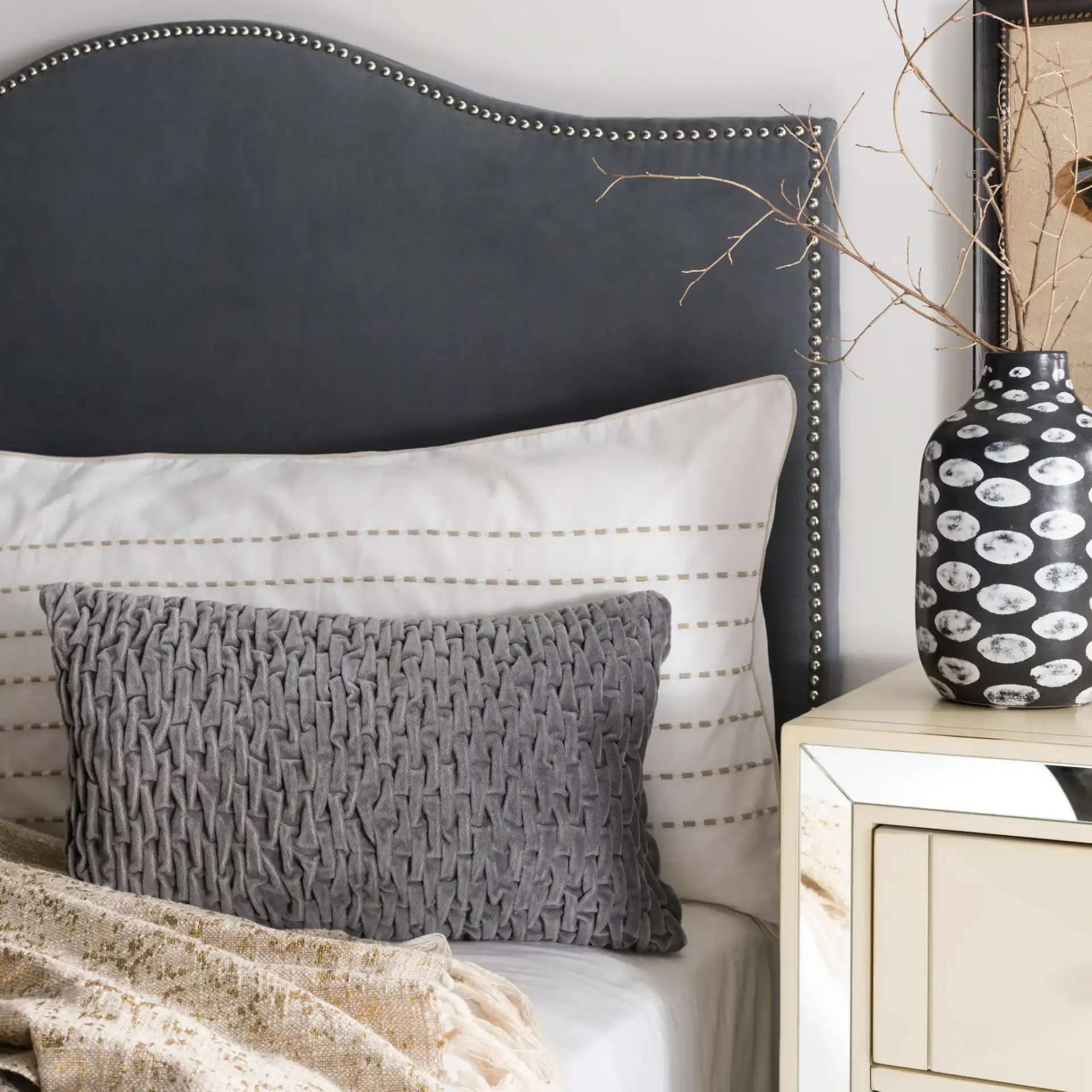 Caine Pillow in Mid Gray in a styled room