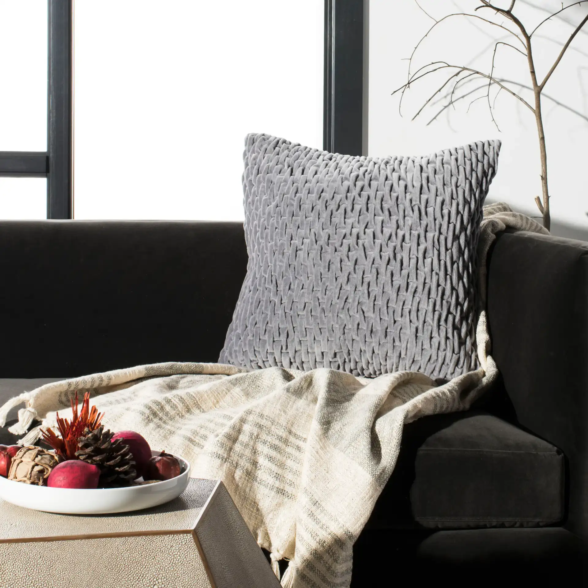 Caine Pillow in Mid Gray in a styled room