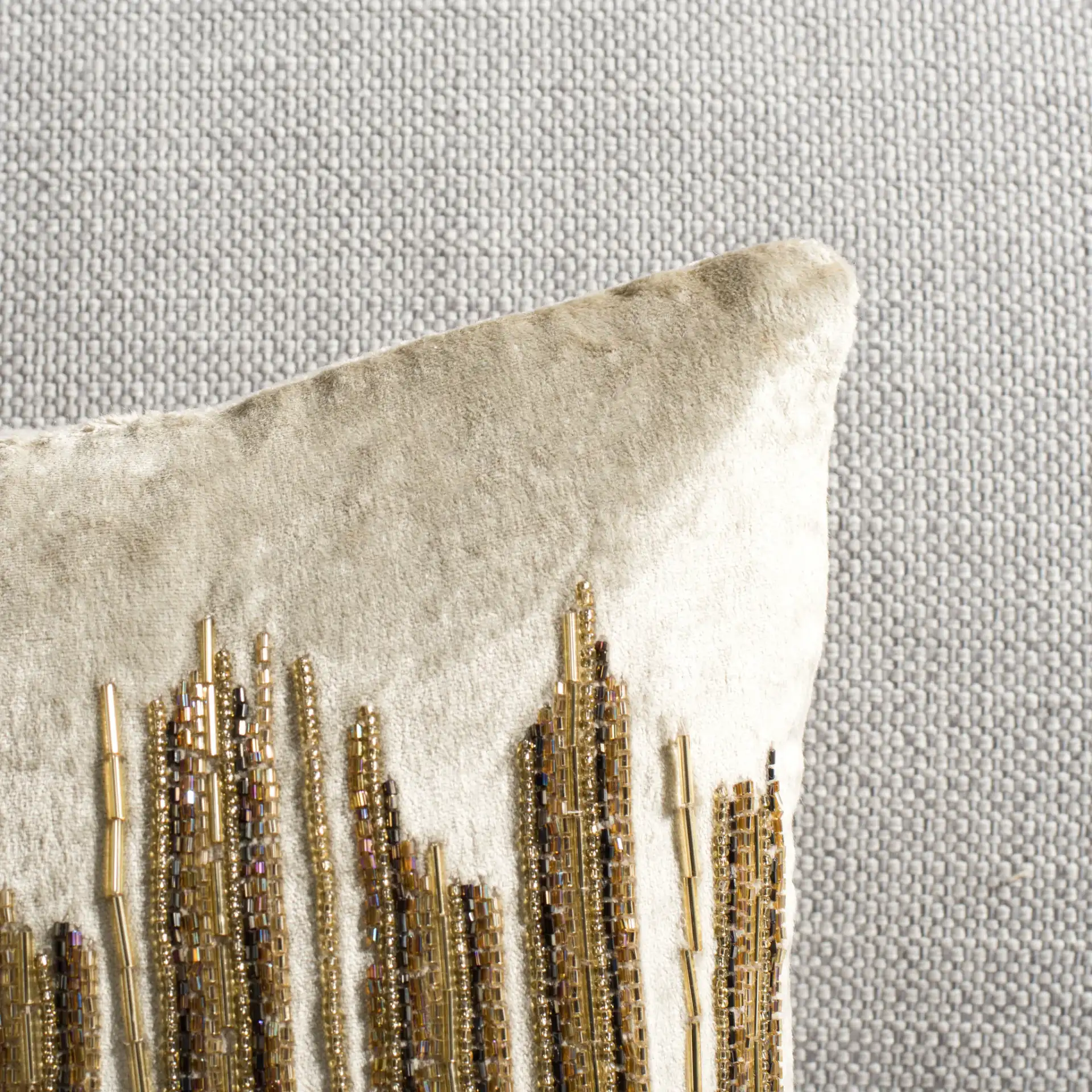 Deston Darling Pillow in Beige / Gold in a styled room